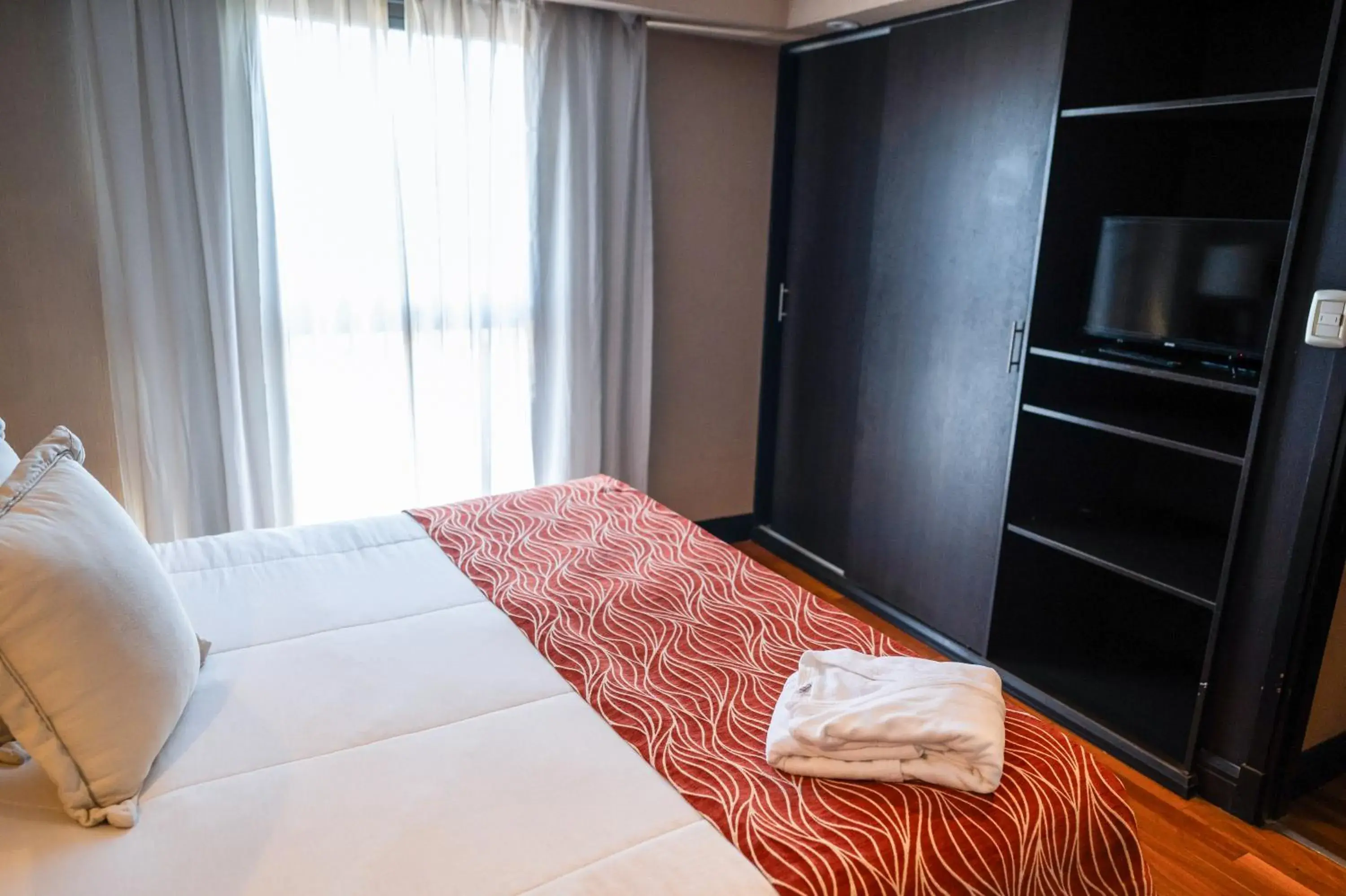 Superior Quadruple Room in Premium Tower Suites Mendoza Superior Quadruple Room in Premium Tower Suites Mendoza