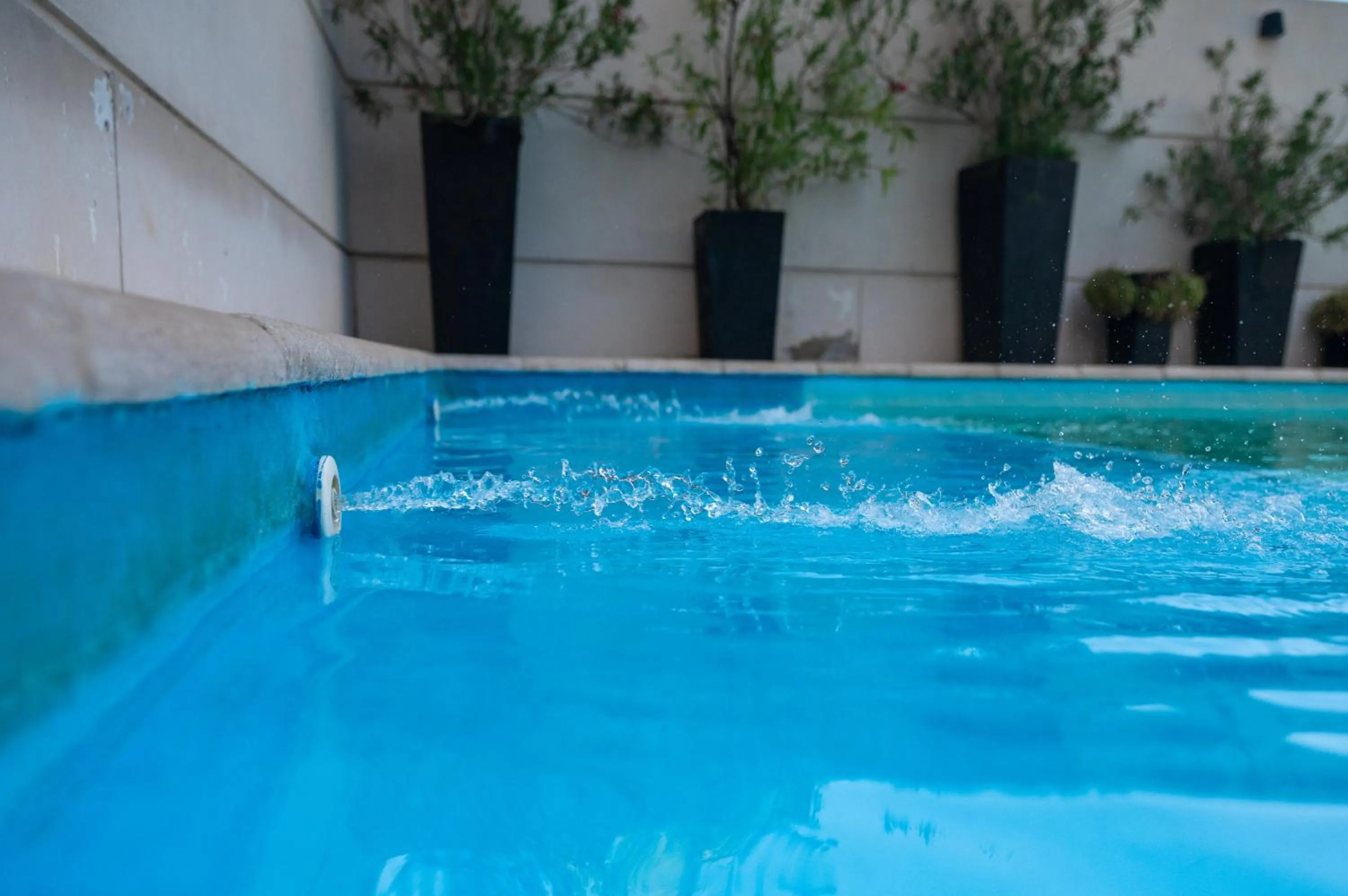 Swimming pool in Premium Tower Suites Mendoza