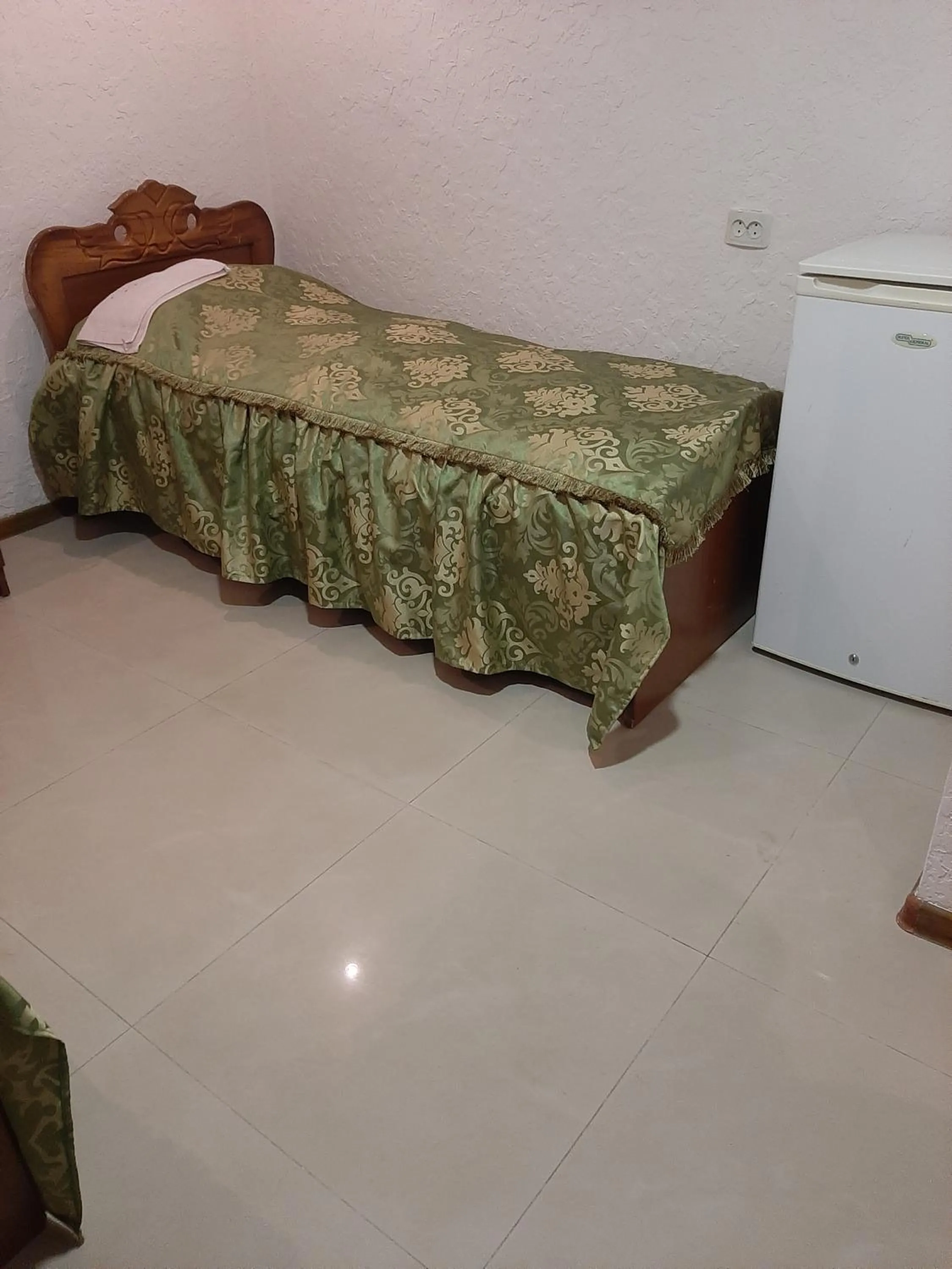 Bed in NarVar Hotel