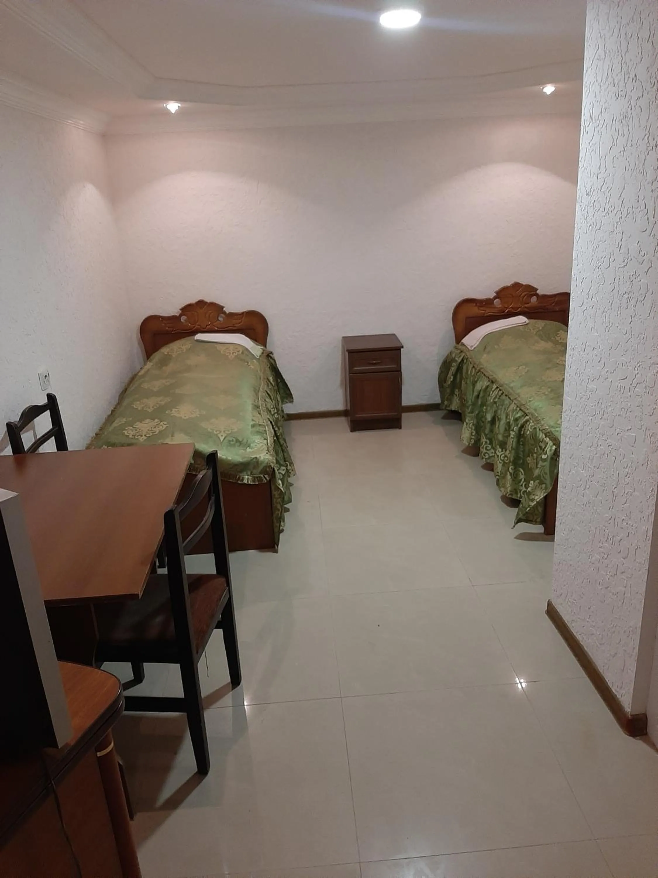 Bed in NarVar Hotel