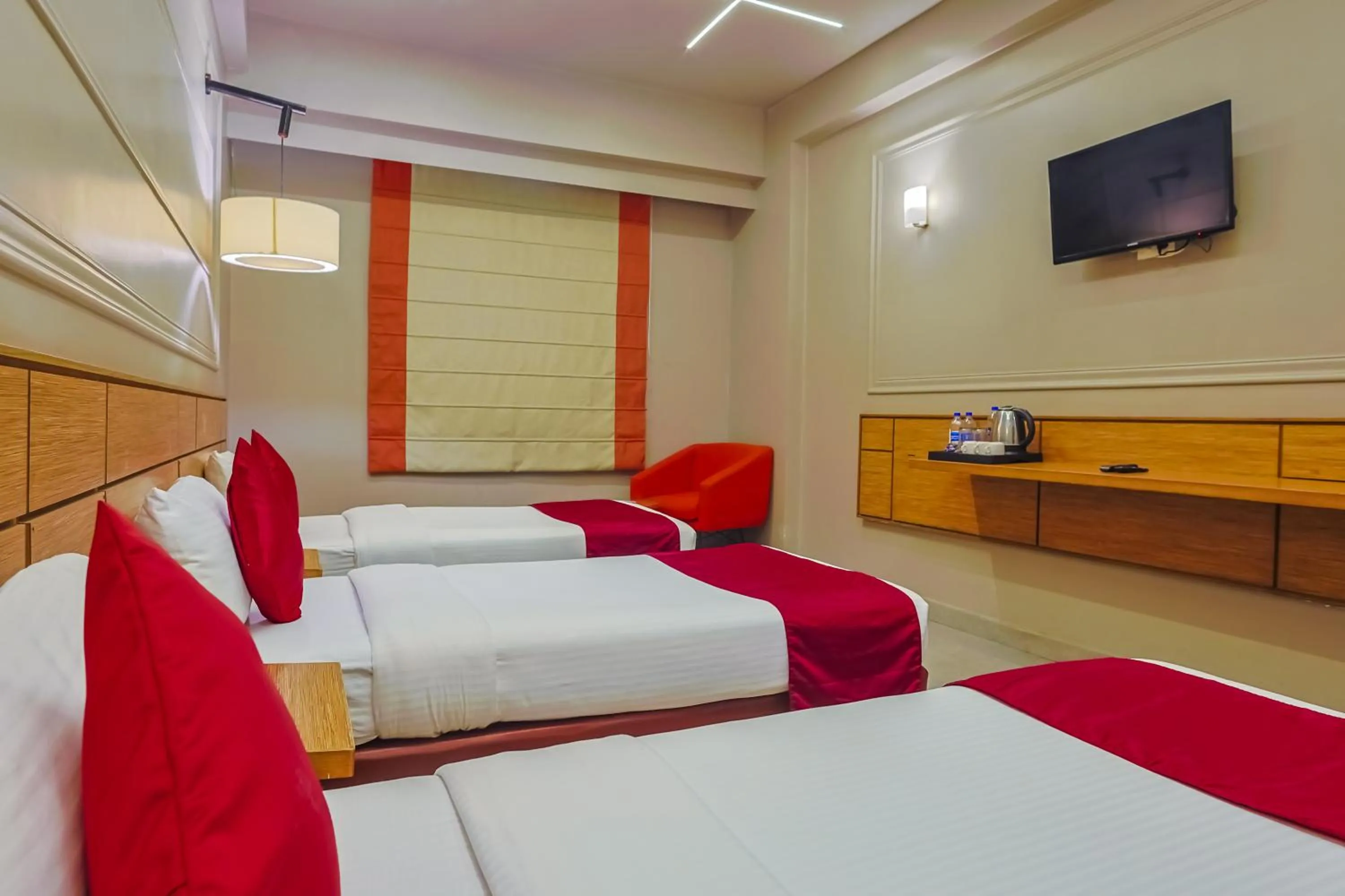 Bed in Max Hotels Prayagraj