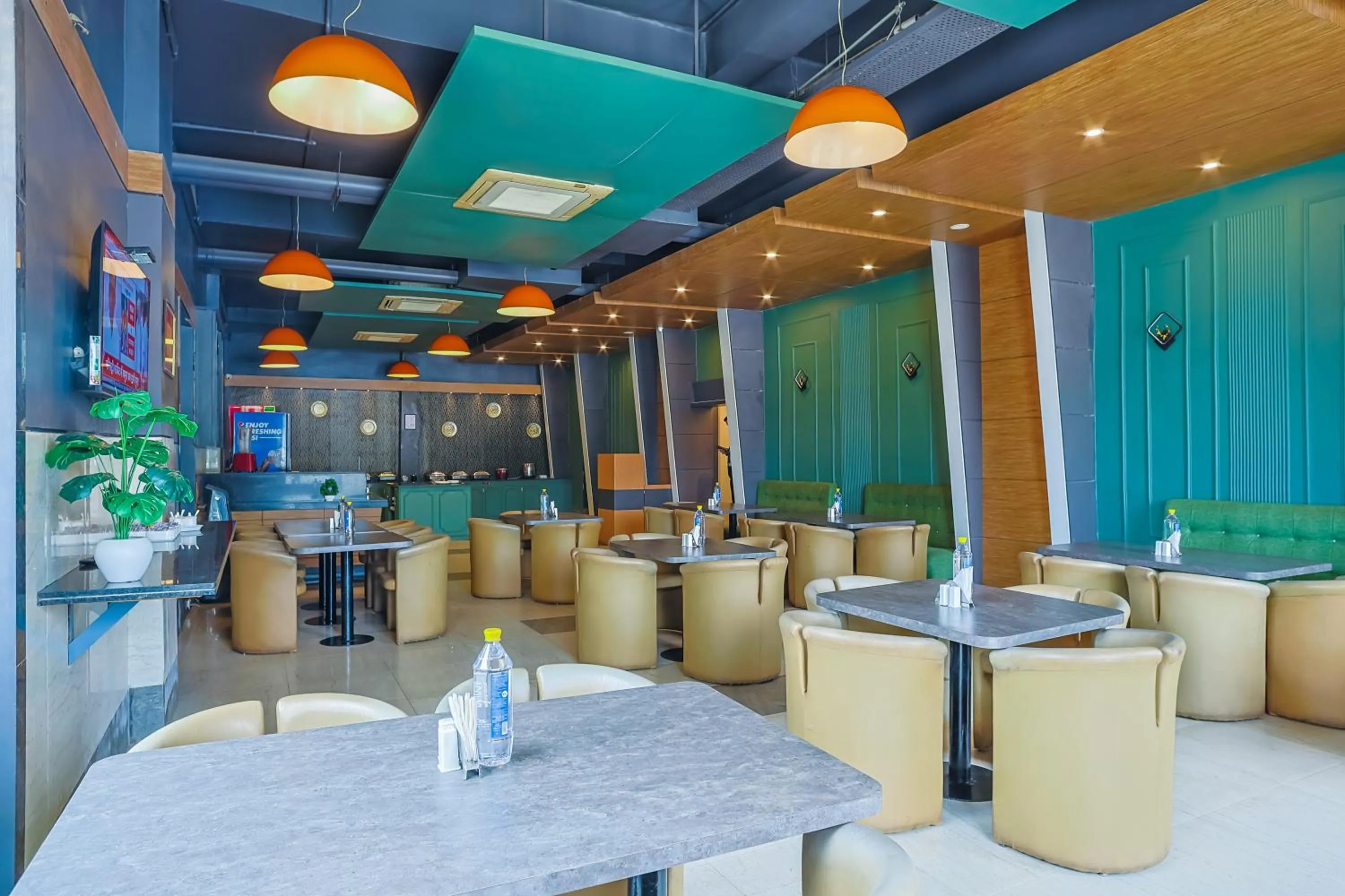 Dining area in Max Hotels Prayagraj
