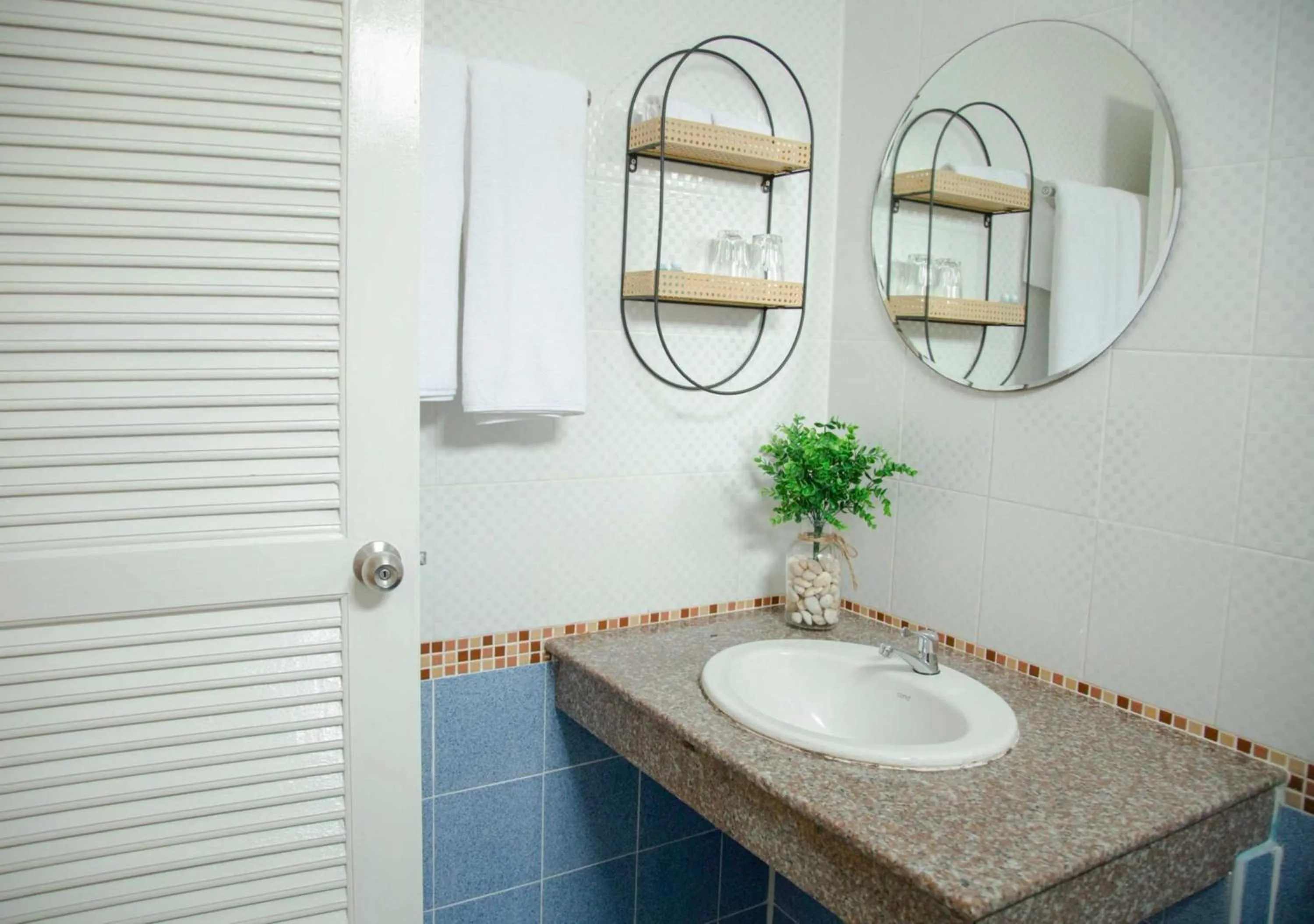 Bathroom in RQ Phuket Patong Beach by Collection O