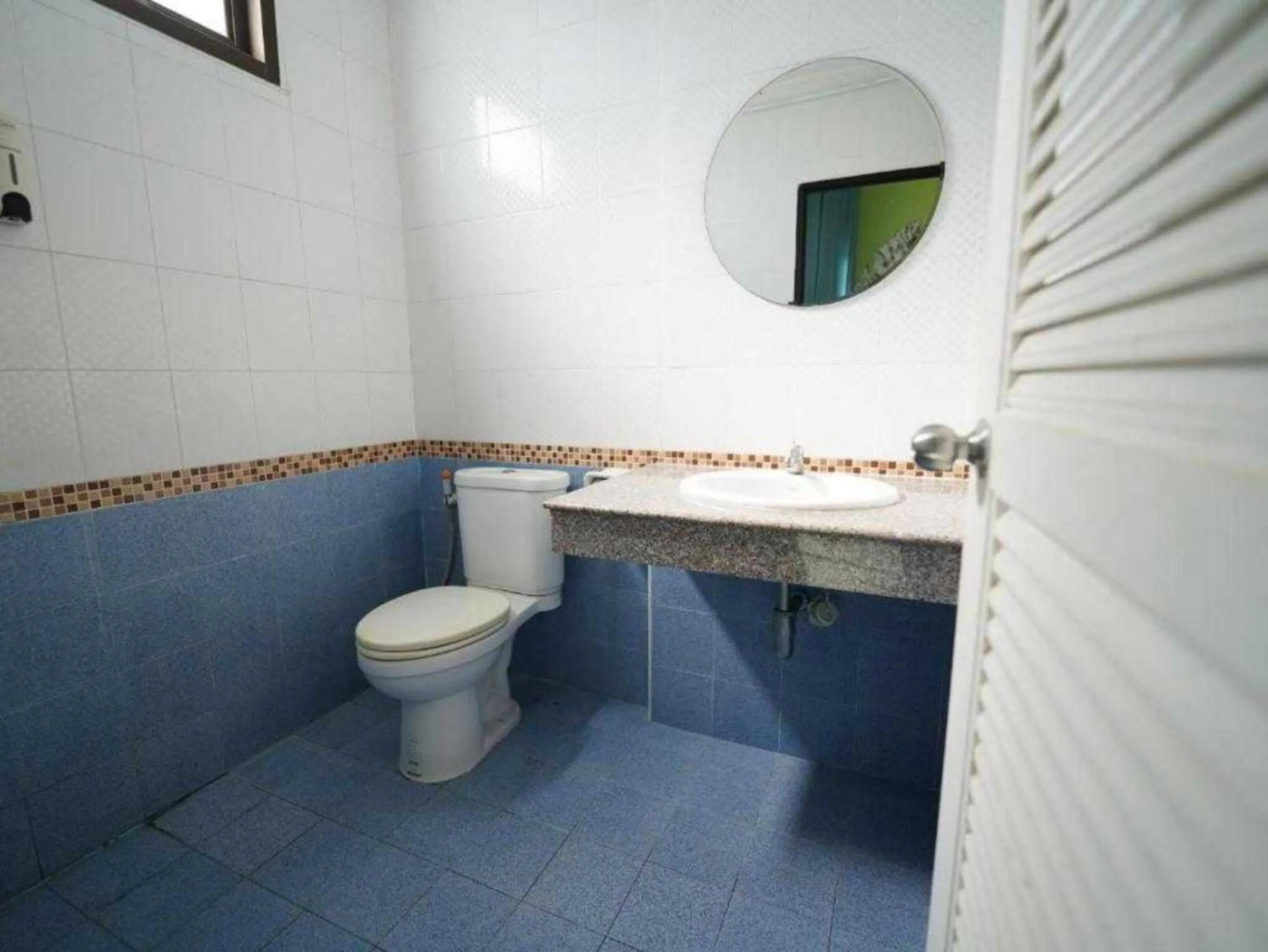 Bathroom in RQ Phuket Patong Beach by Collection O