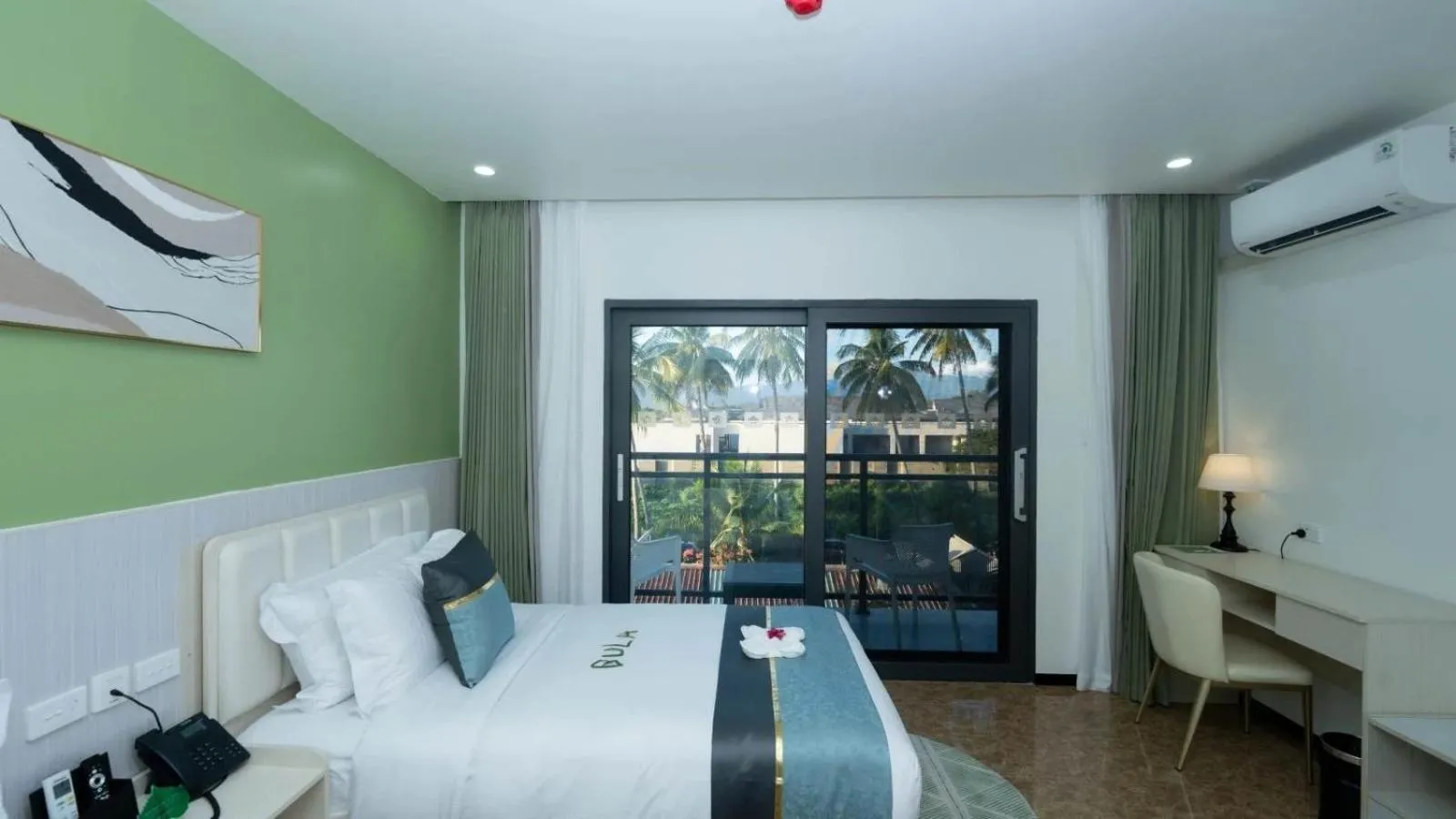 Photo of the whole room, Bed in Wyndham Garden Wailoaloa Beach Fiji