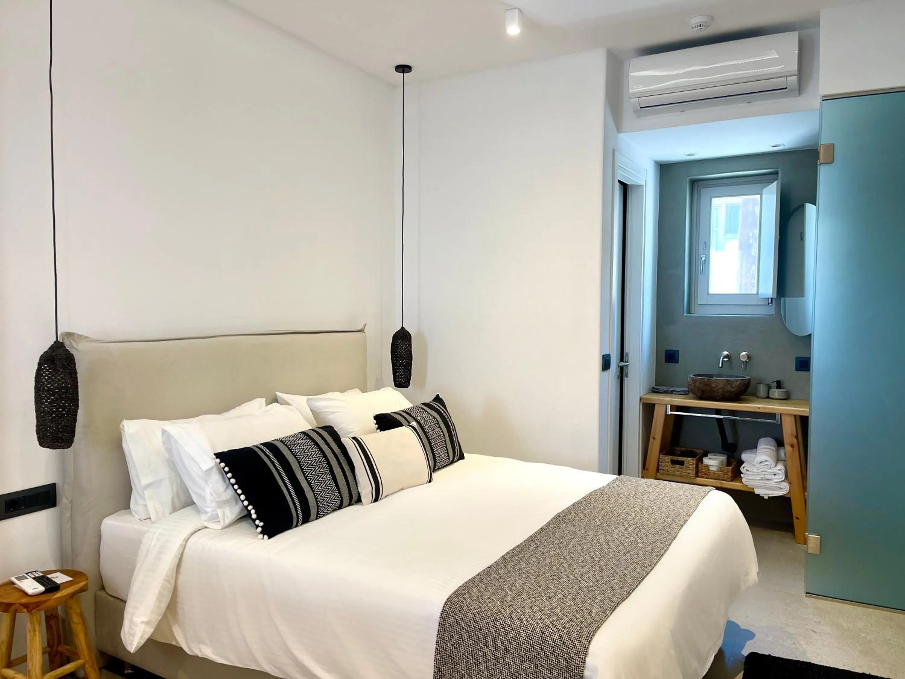 Bed in Mykonos Dot Suites