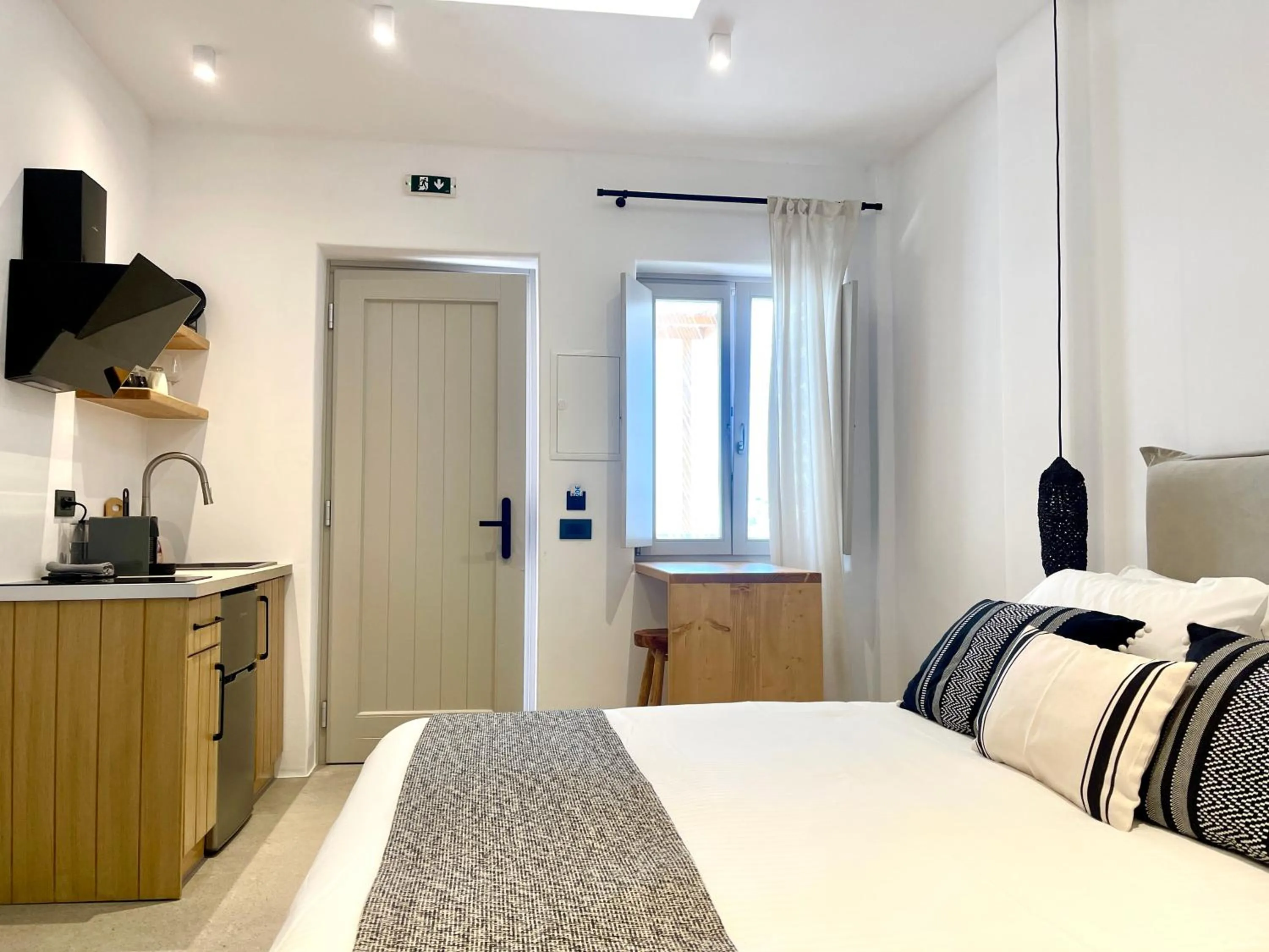 Bed in Mykonos Dot Suites