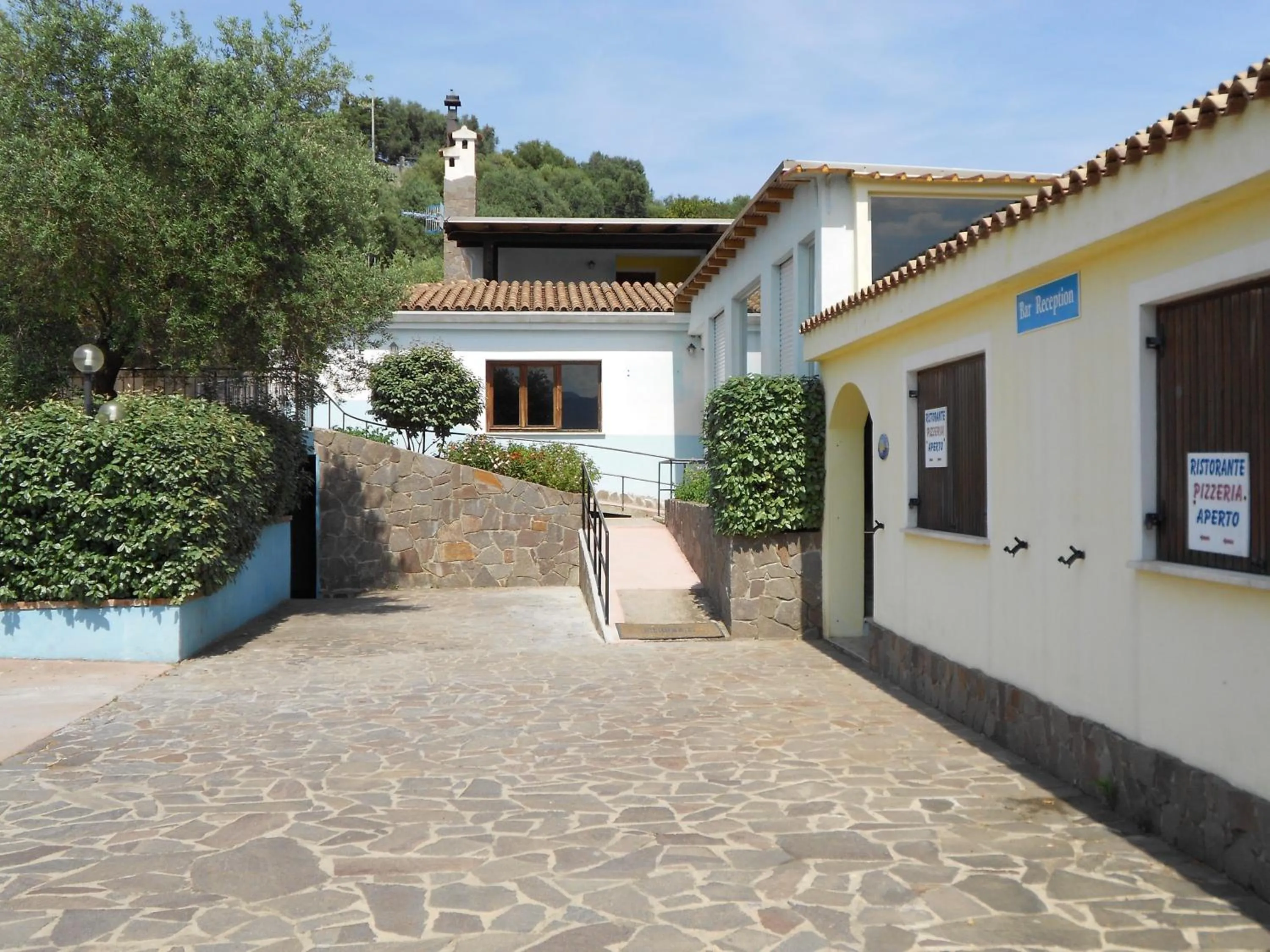 Facade/entrance in La Corte Degli Ulivi