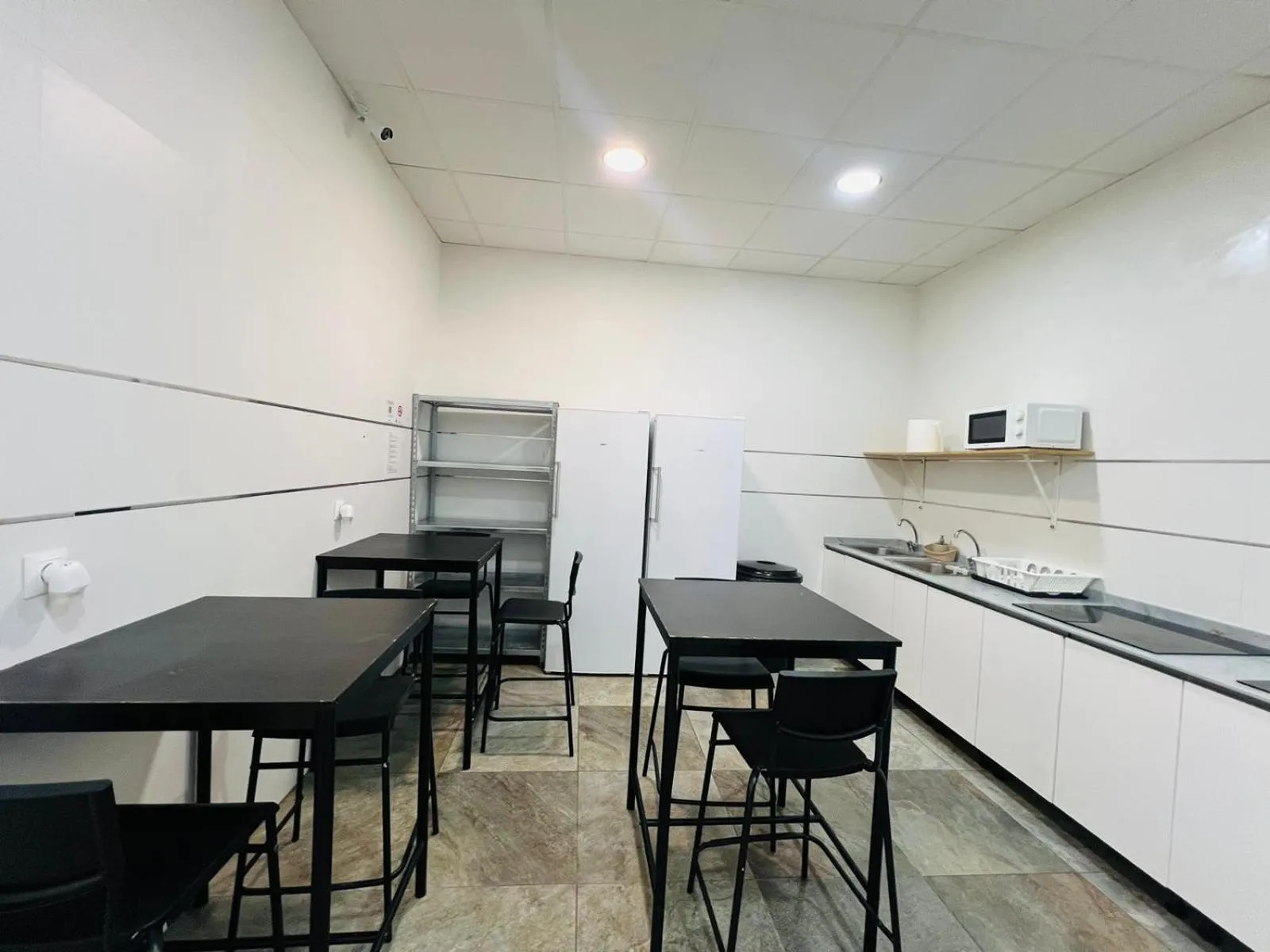 Kitchen or kitchenette in Cubik Rooms