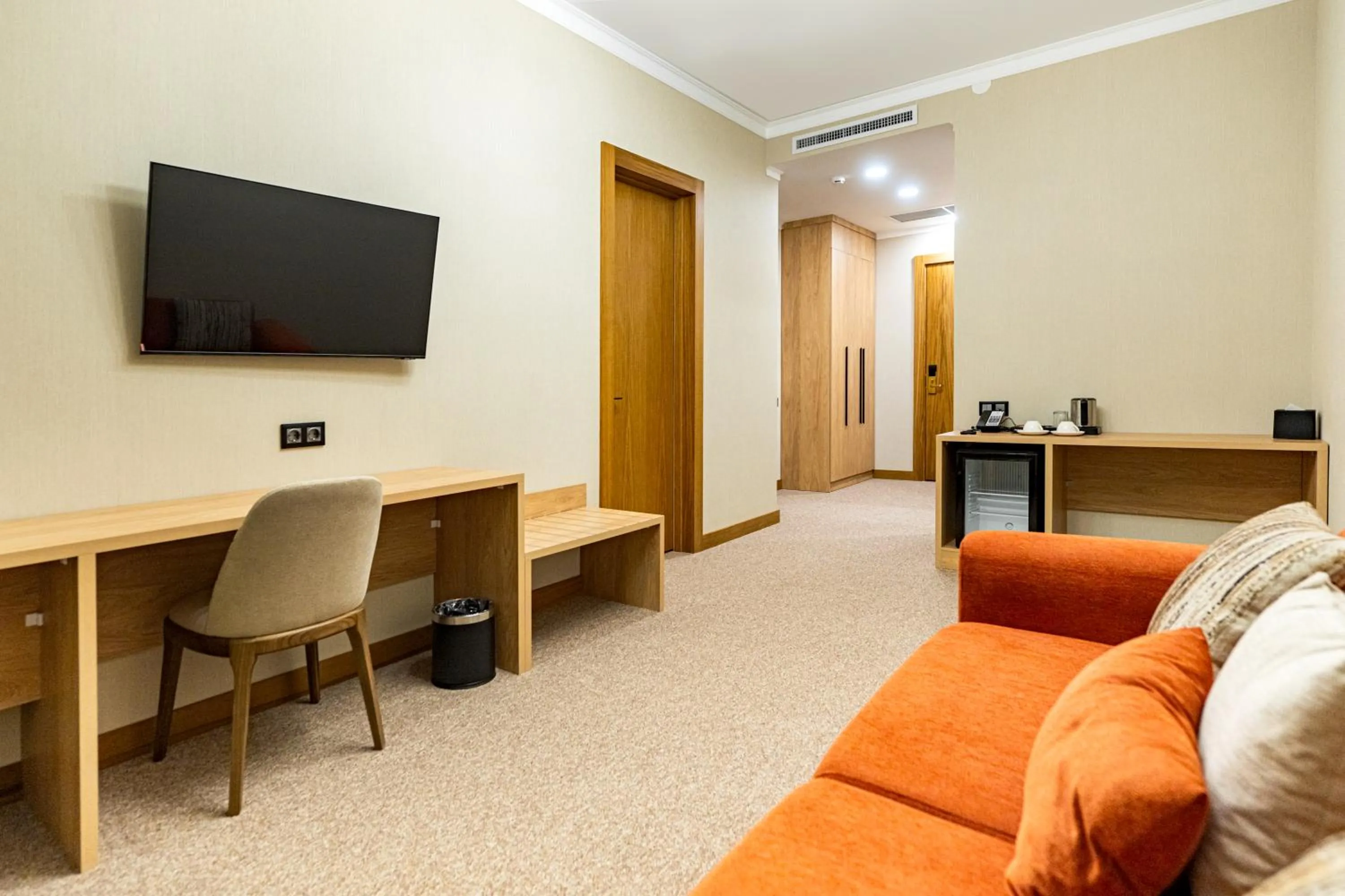 Communal lounge/ TV room in Mardan Hotel