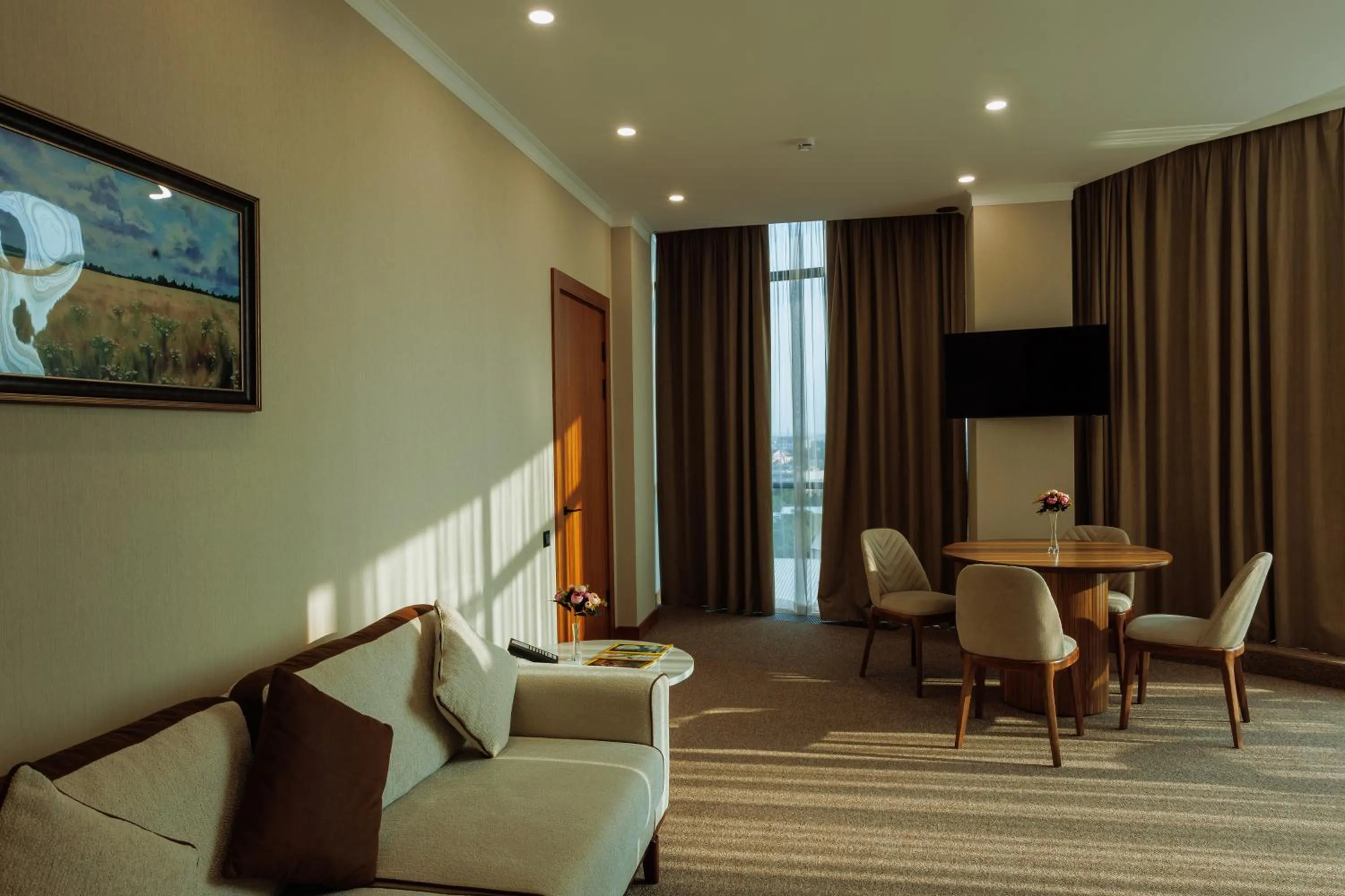 Communal lounge/ TV room in Mardan Hotel