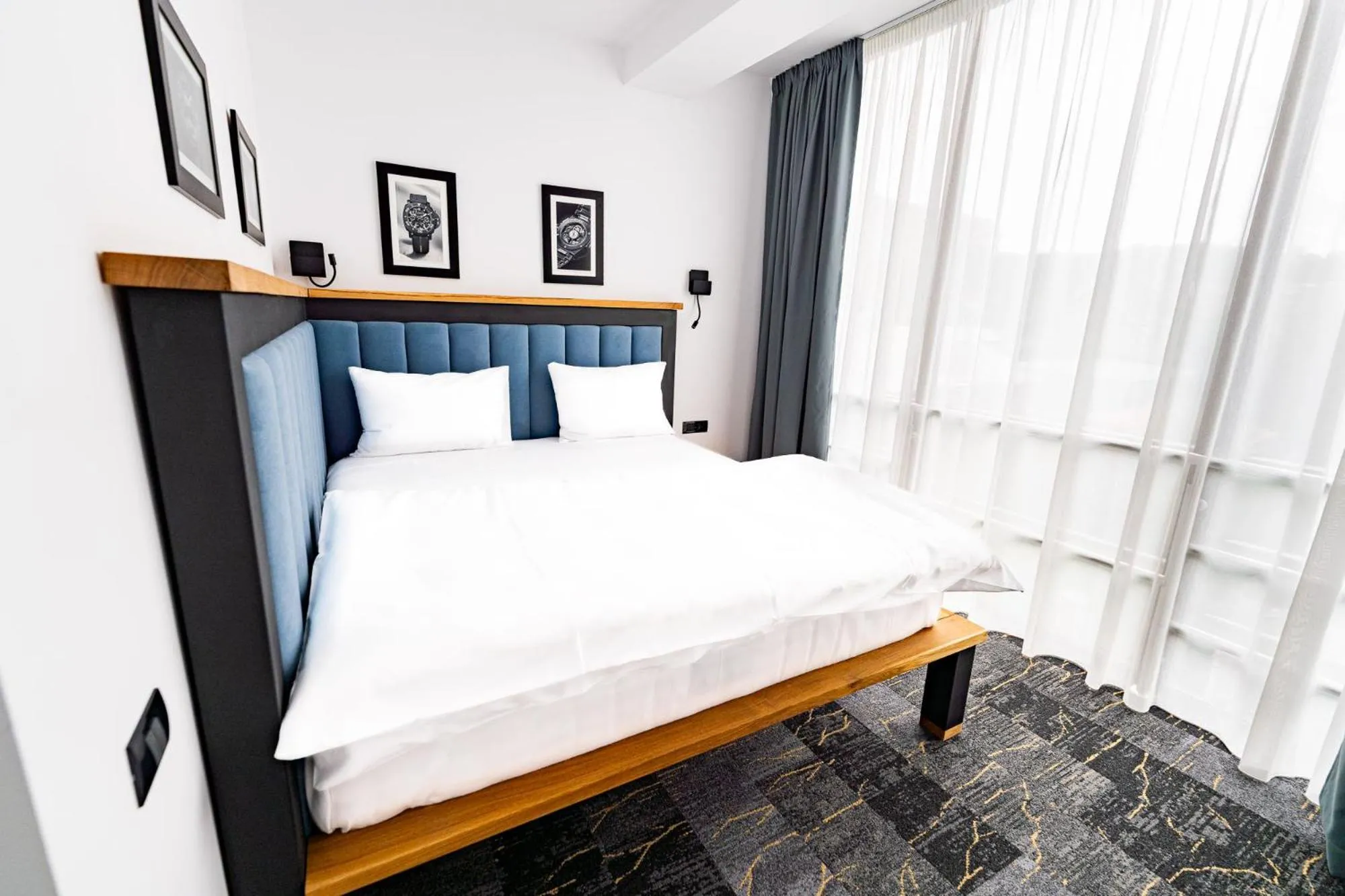 Bed in HOW Boutique and Hotel