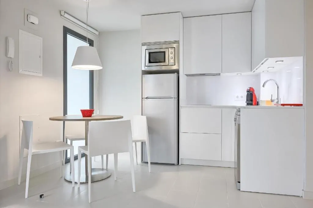 Kitchen or kitchenette in 1935 Hotel Boutique & Apartments - Adults Only