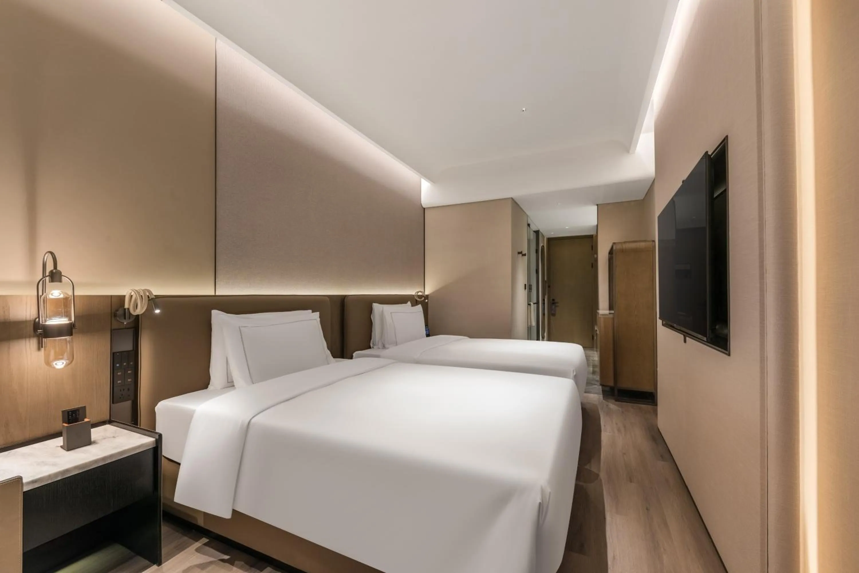 Bed in UrCove by Hyatt Shenzhen Bay Mixc