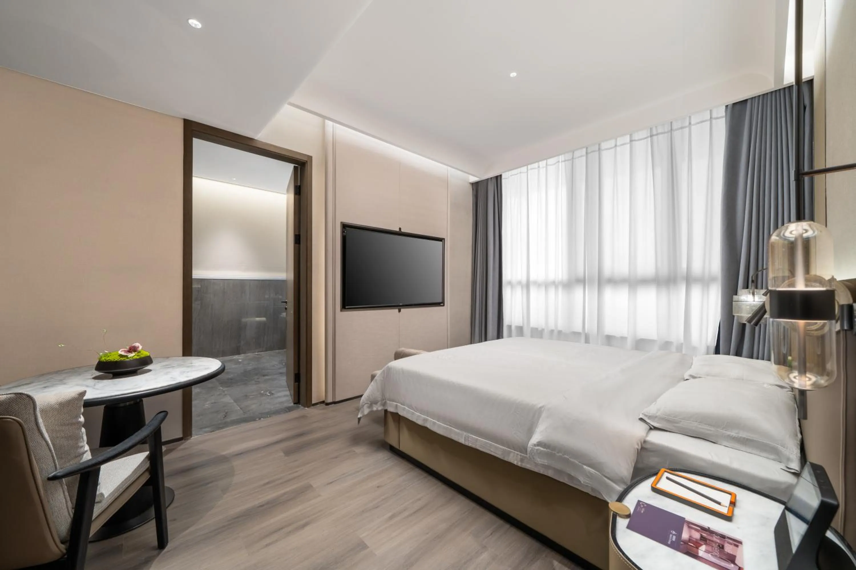 Bed in UrCove by Hyatt Shenzhen Bay Mixc
