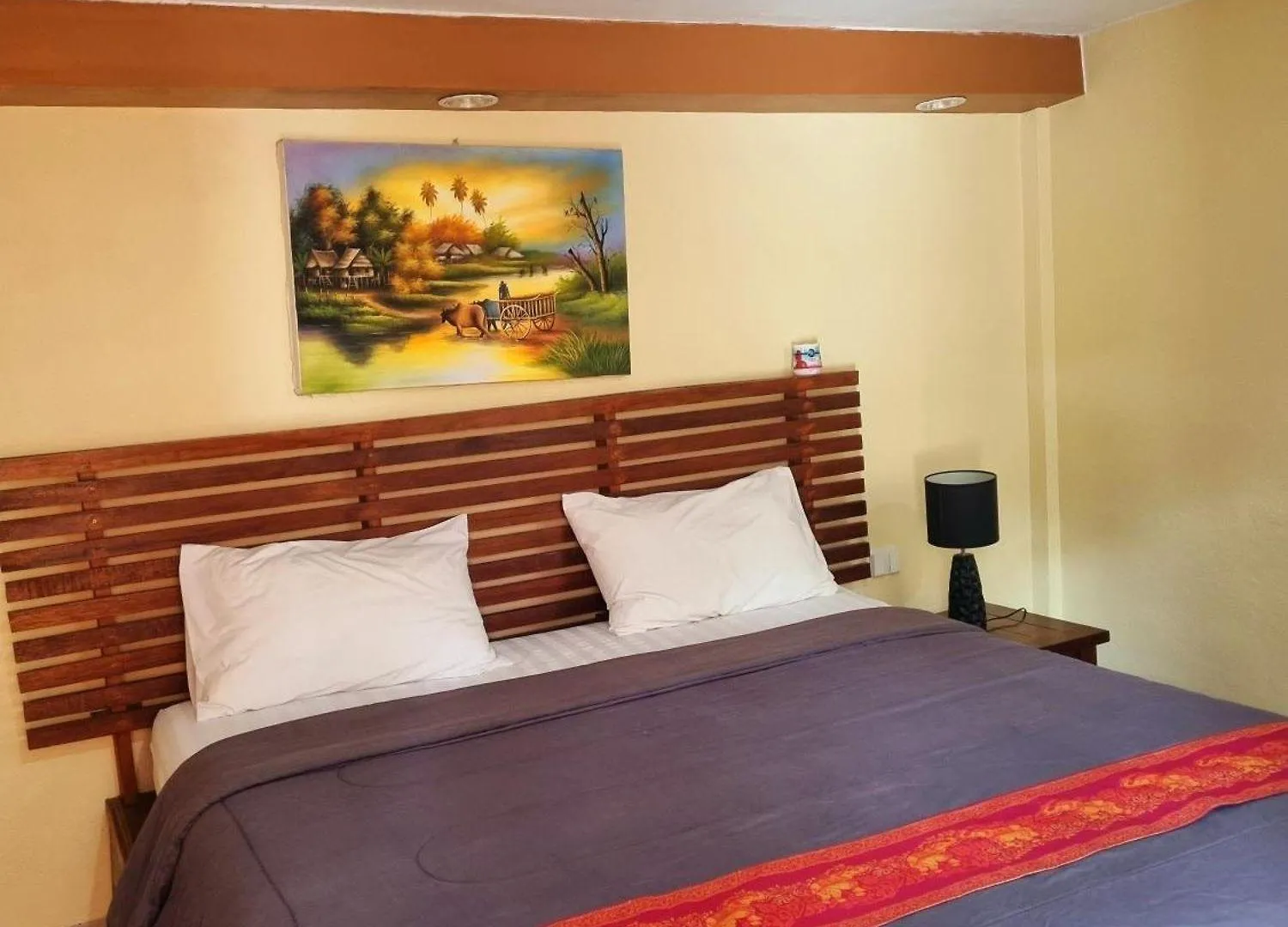 Bed in The Windsor Boutique Resort