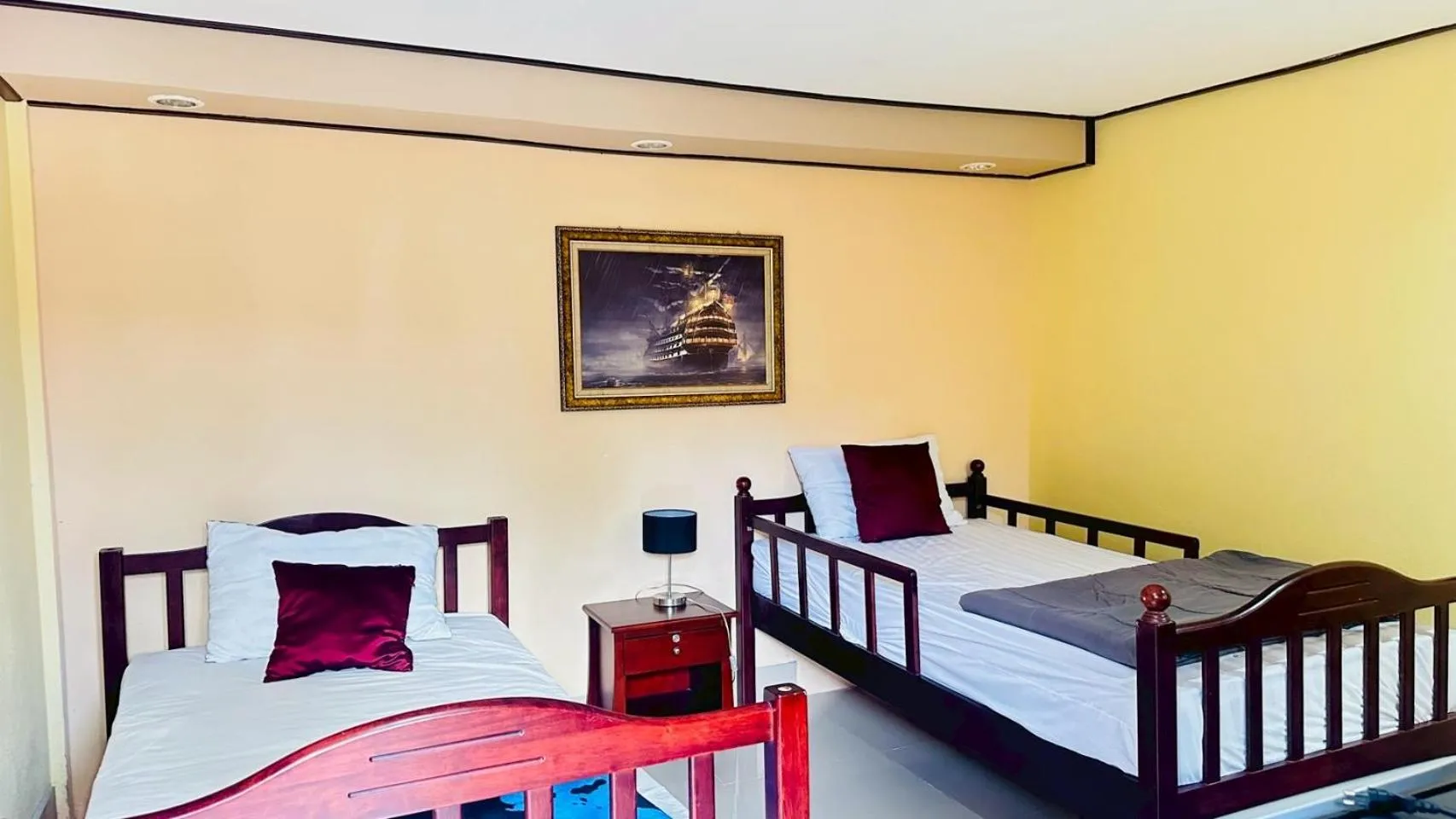 Bed in The Windsor Boutique Resort