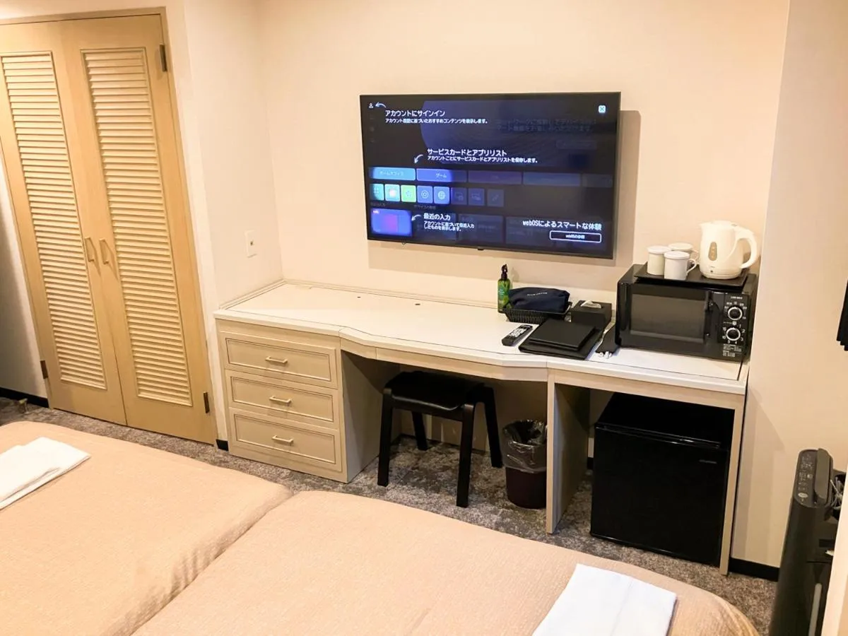 Bed in Hotel LiVEMAX Tendo