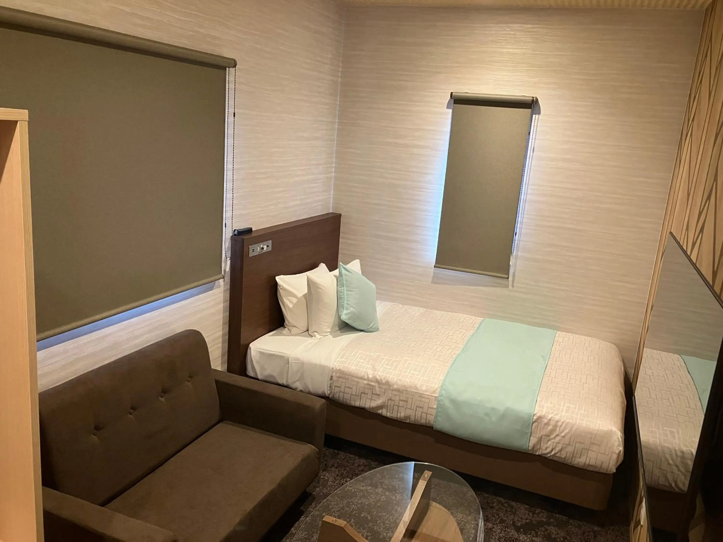 Bed in Hotel LiVEMAX Tendo