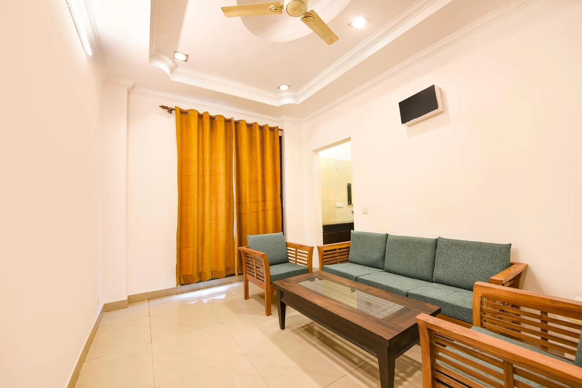 Seating area in FabHotel Velvet Suites Near Millennium City Centre Gurugram
