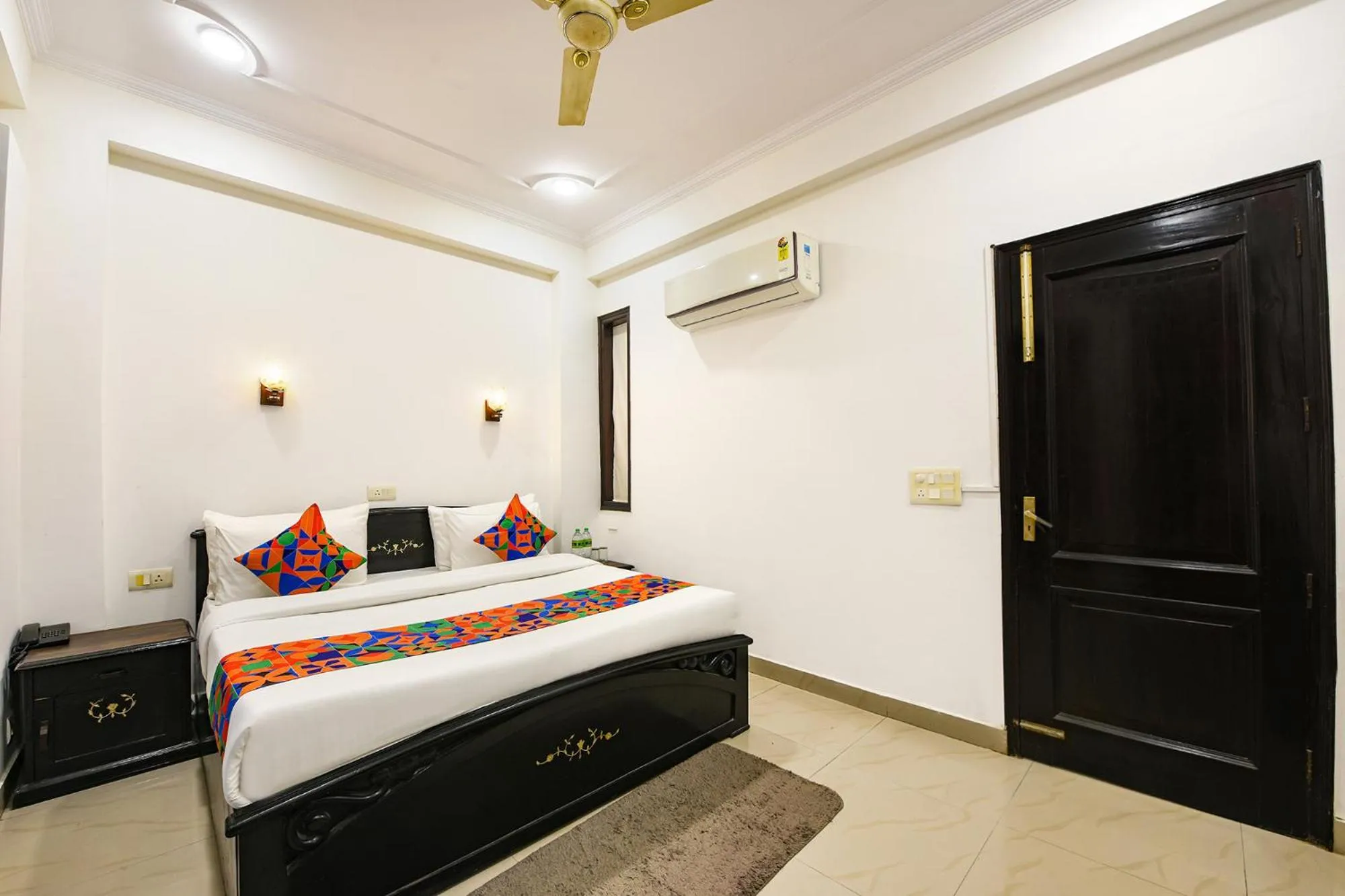 Bed in FabHotel Velvet Suites Near Millennium City Centre Gurugram