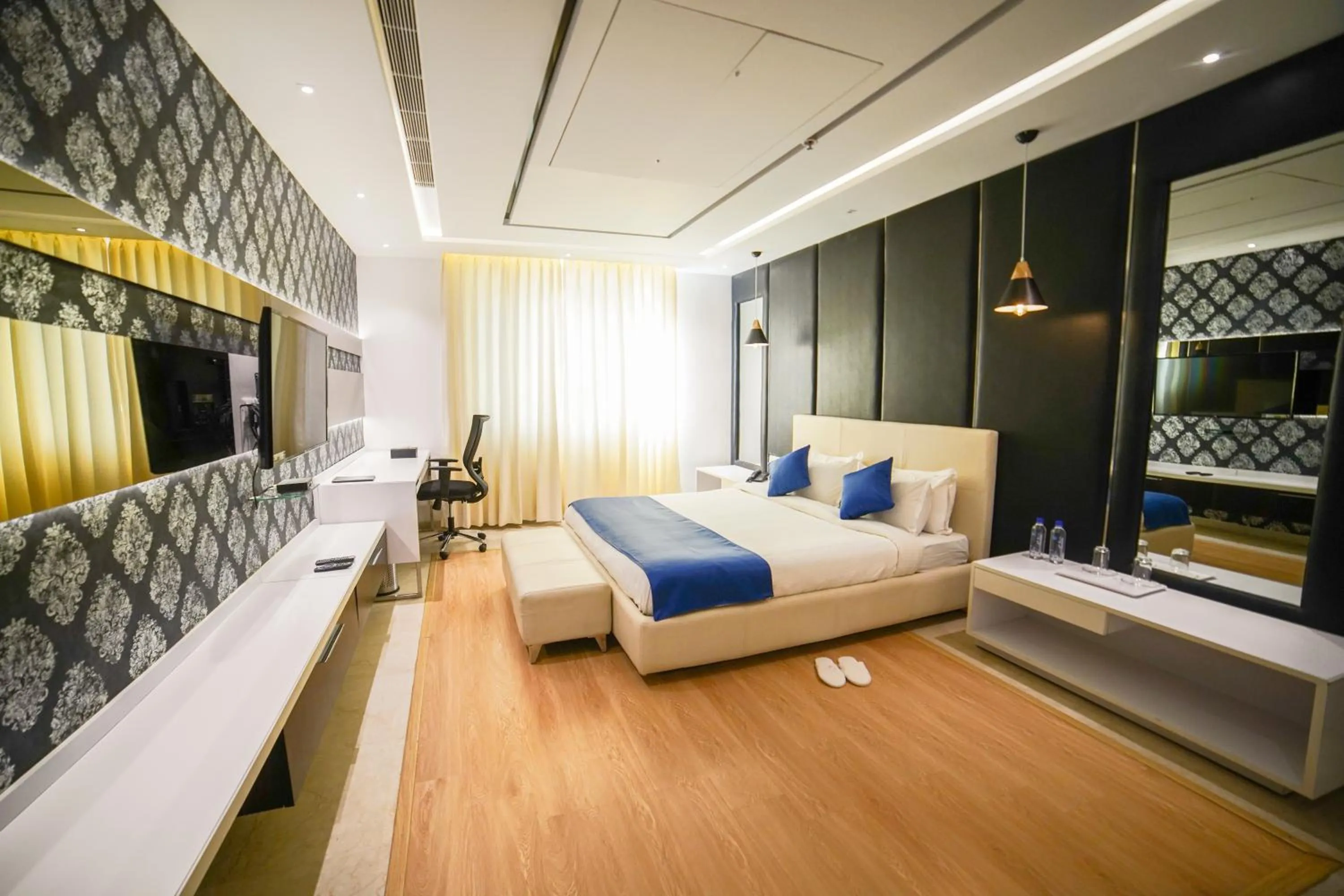 Bed in BNGV Grandeur Hotel & Banquets