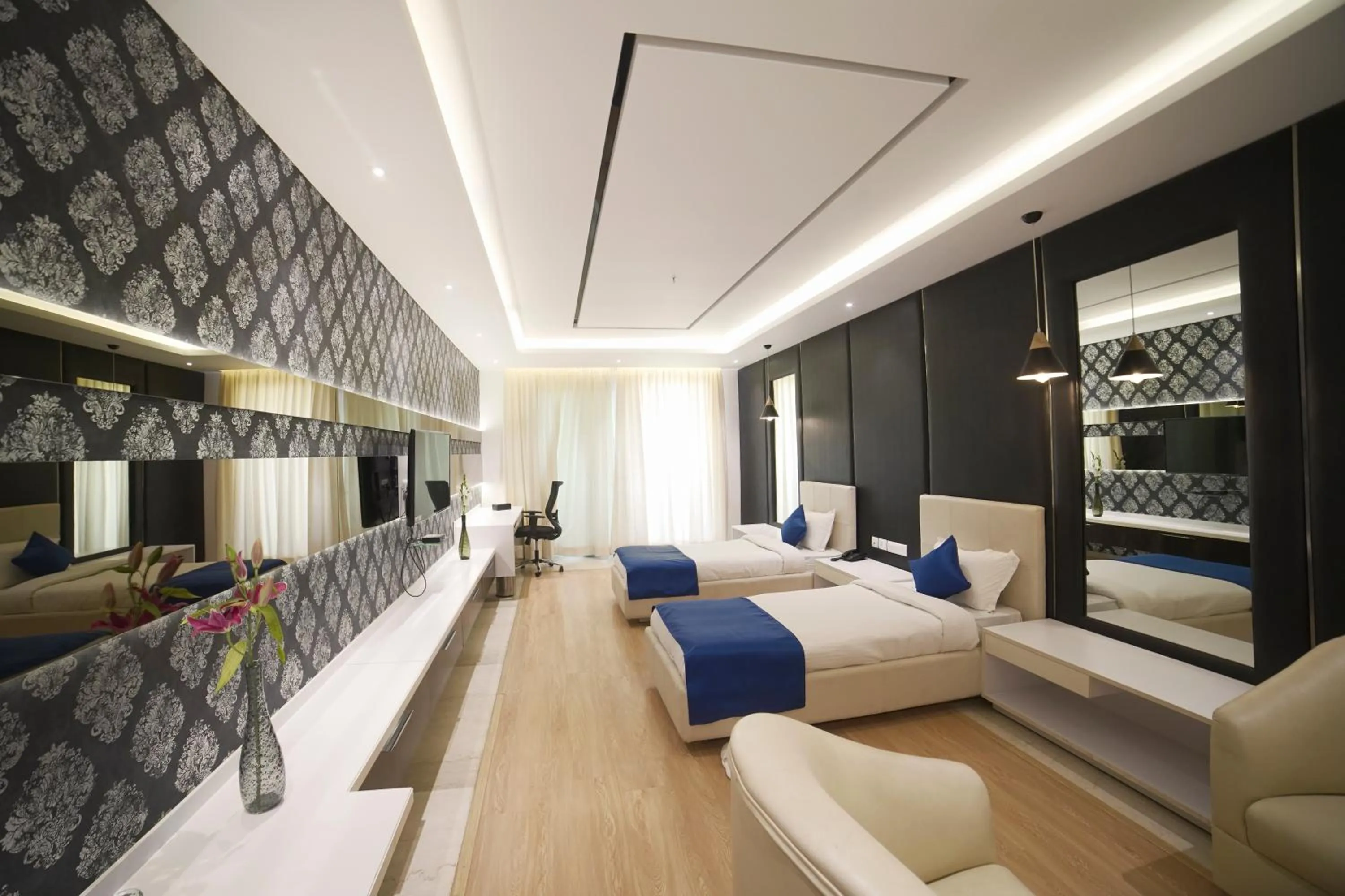 Bed in BNGV Grandeur Hotel & Banquets