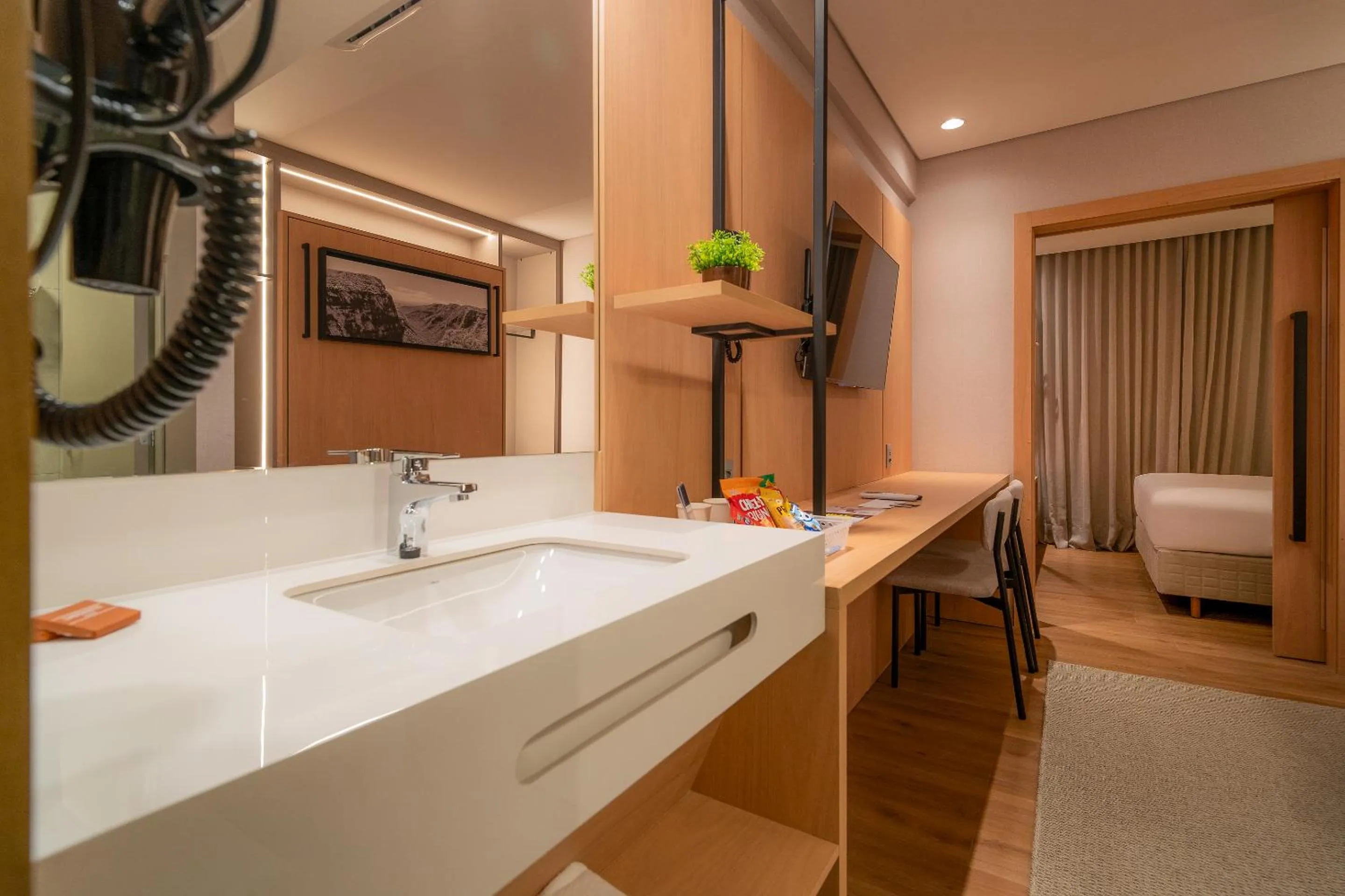 Bathroom in Golden Tulip Canela OFICIAL