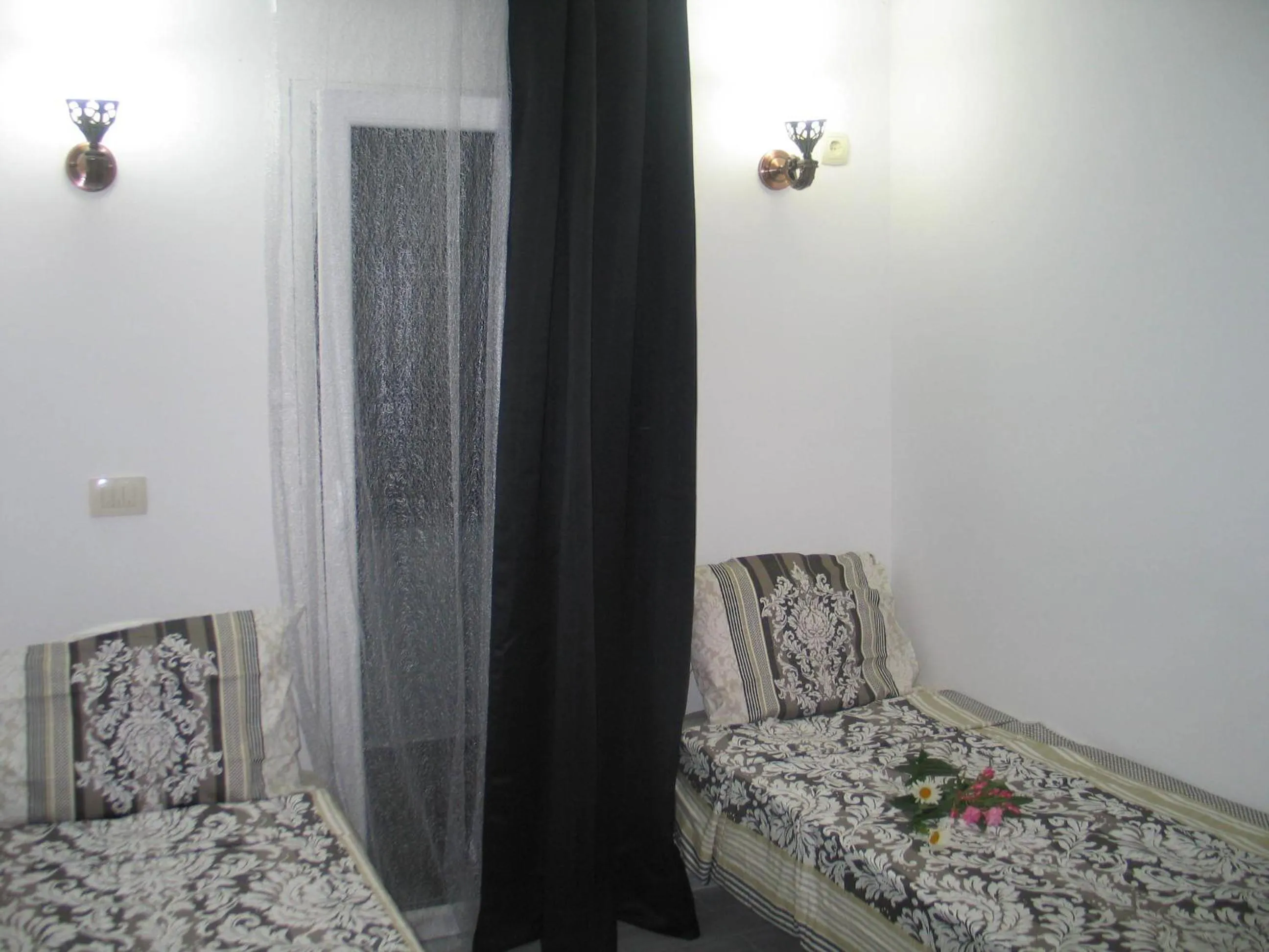 Twin Room with Balcony - single occupancy in Guest House Dena