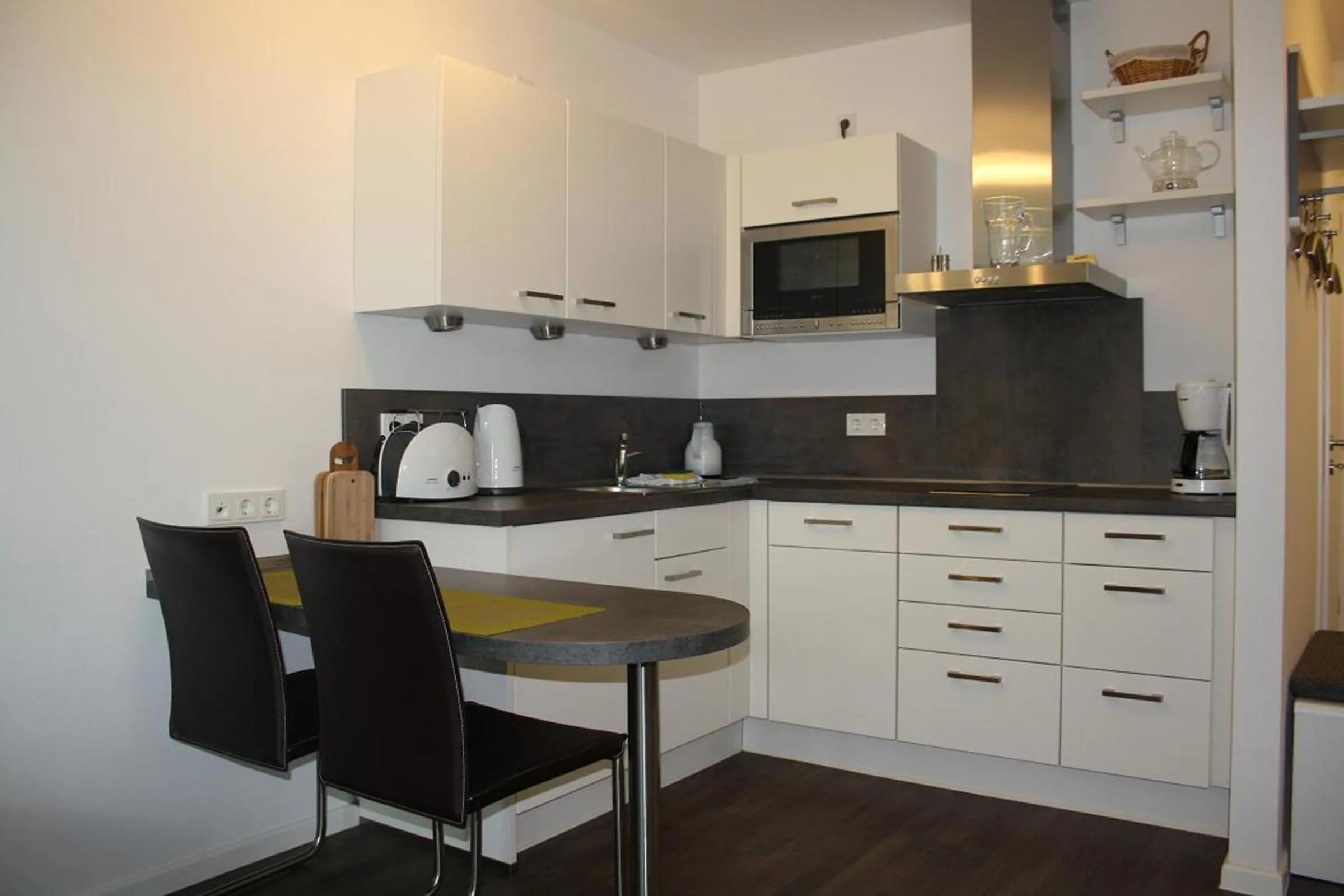 Kitchen or kitchenette in Residenz am Balmer See - BS 03 mit Wellnessbereich