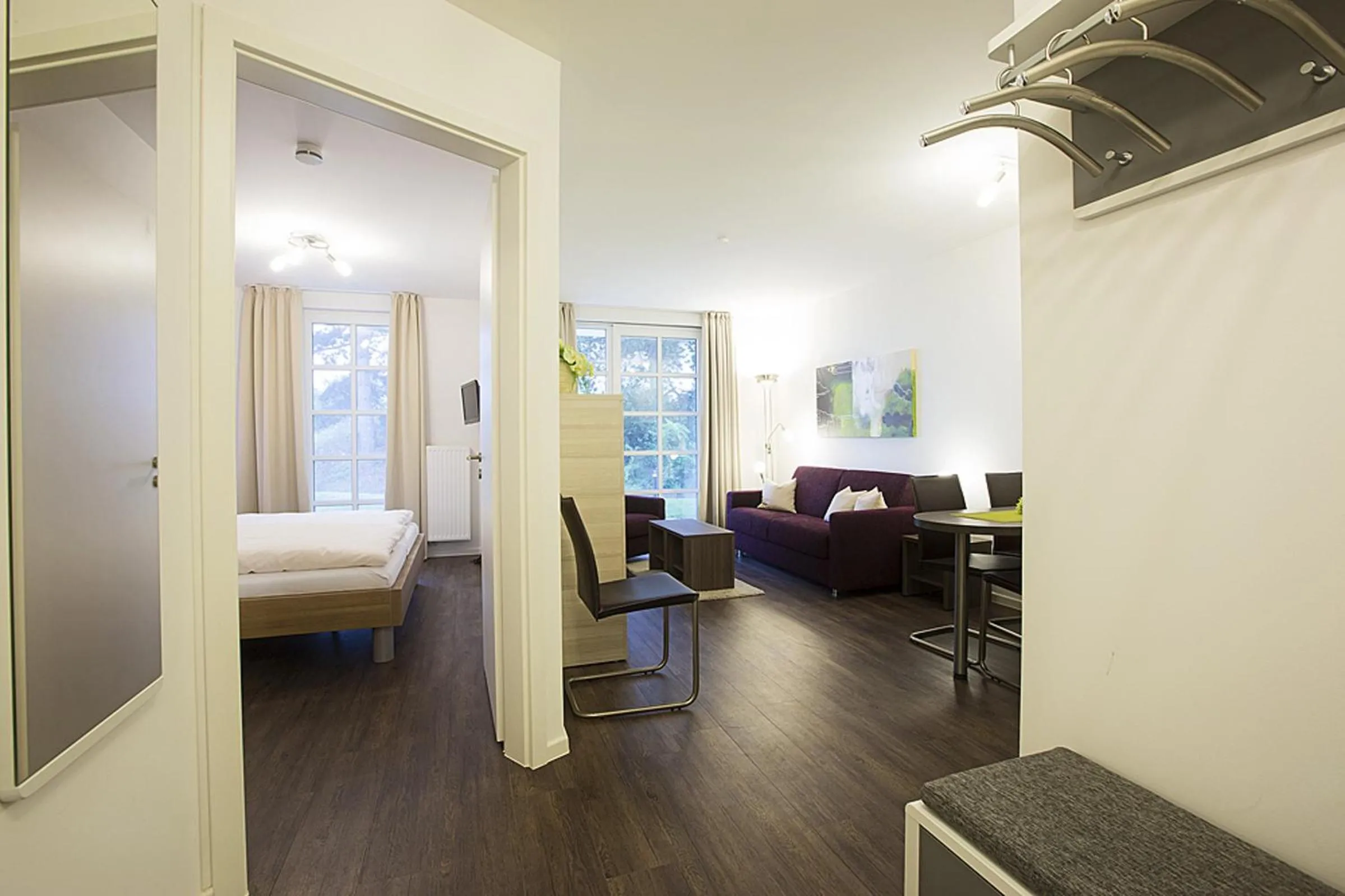 Living room, Bed in Residenz am Balmer See - BS 03 mit Wellnessbereich