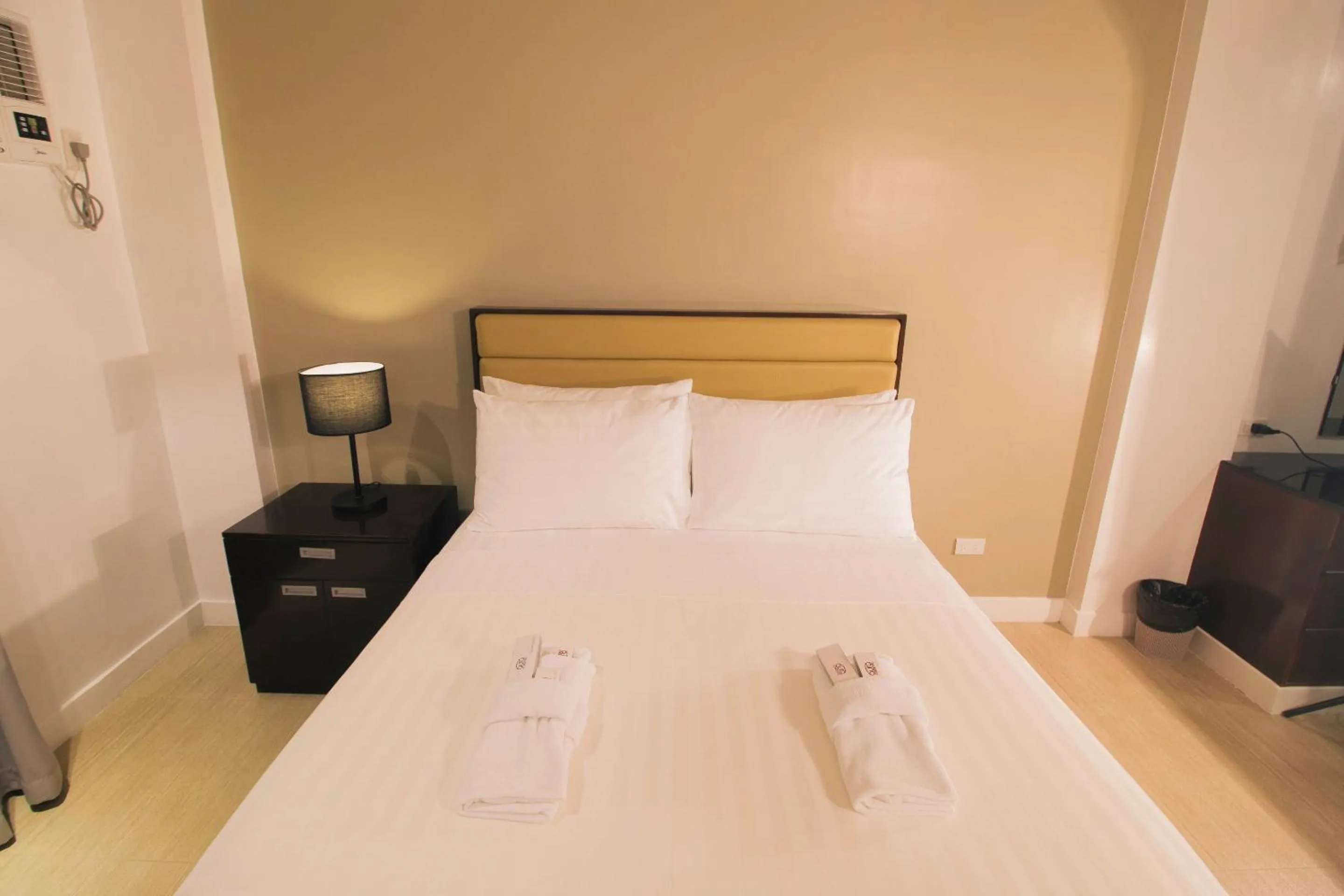 Bed in Aura Condotel