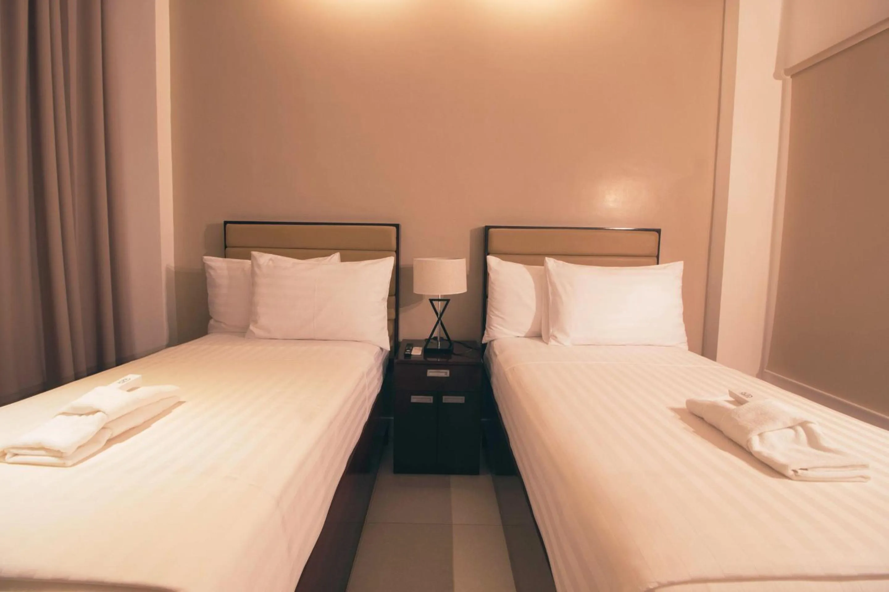 Bed in Aura Condotel
