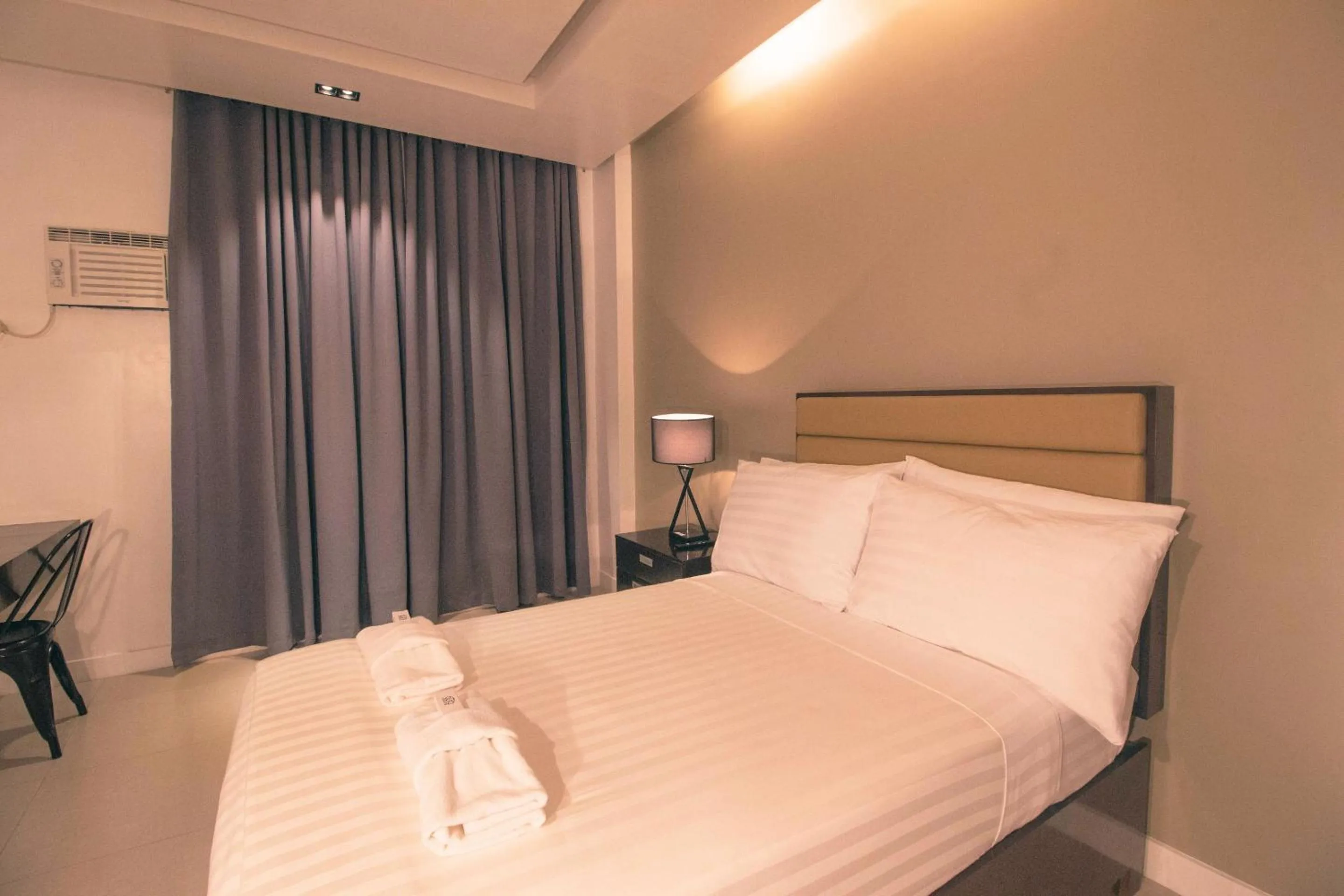 Bed in Aura Condotel