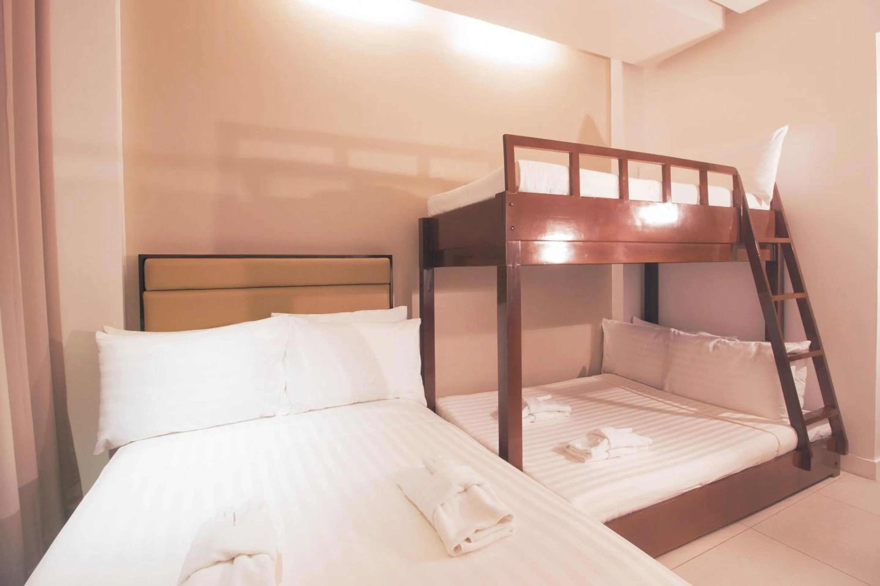 Bed in Aura Condotel