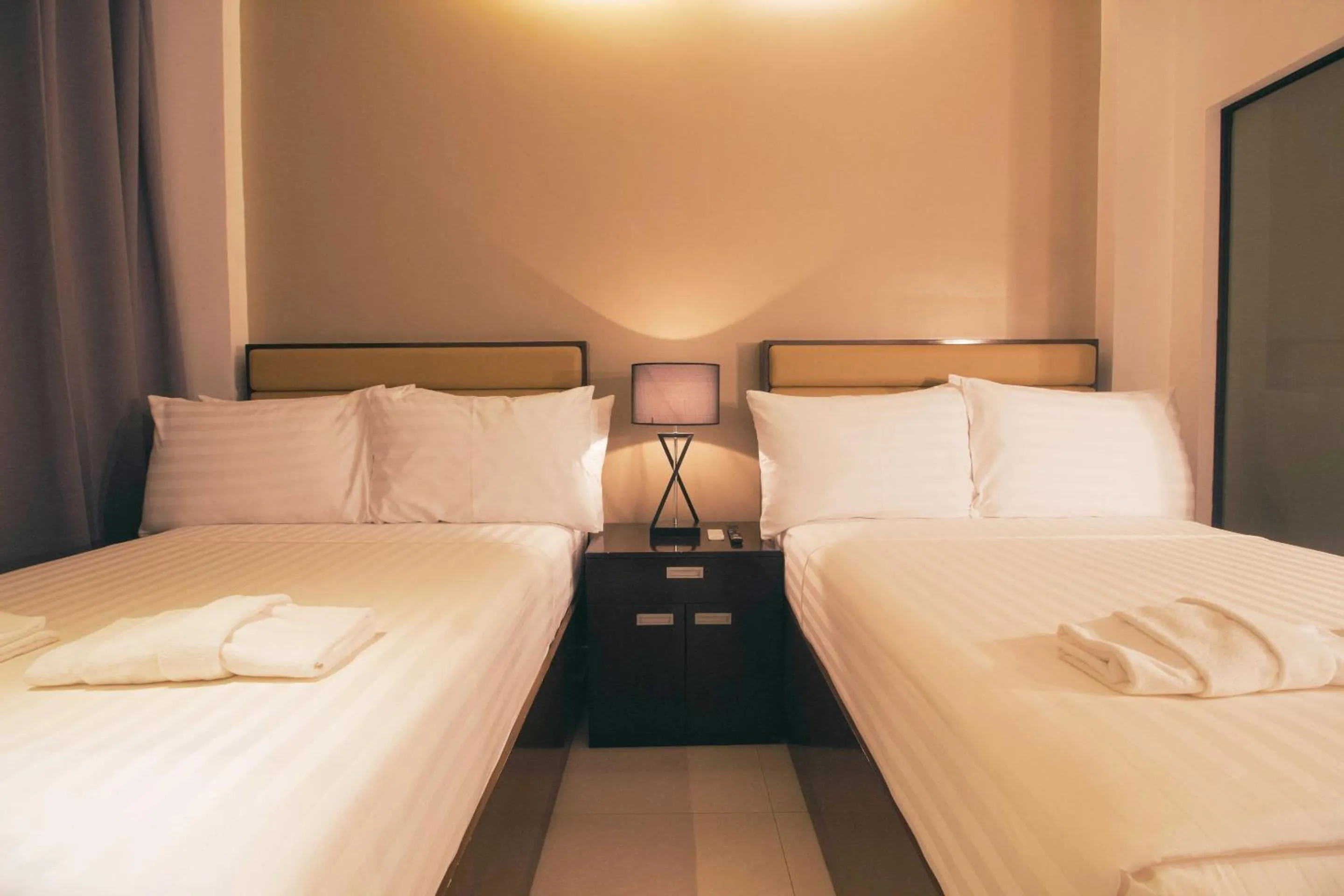 Bed in Aura Condotel