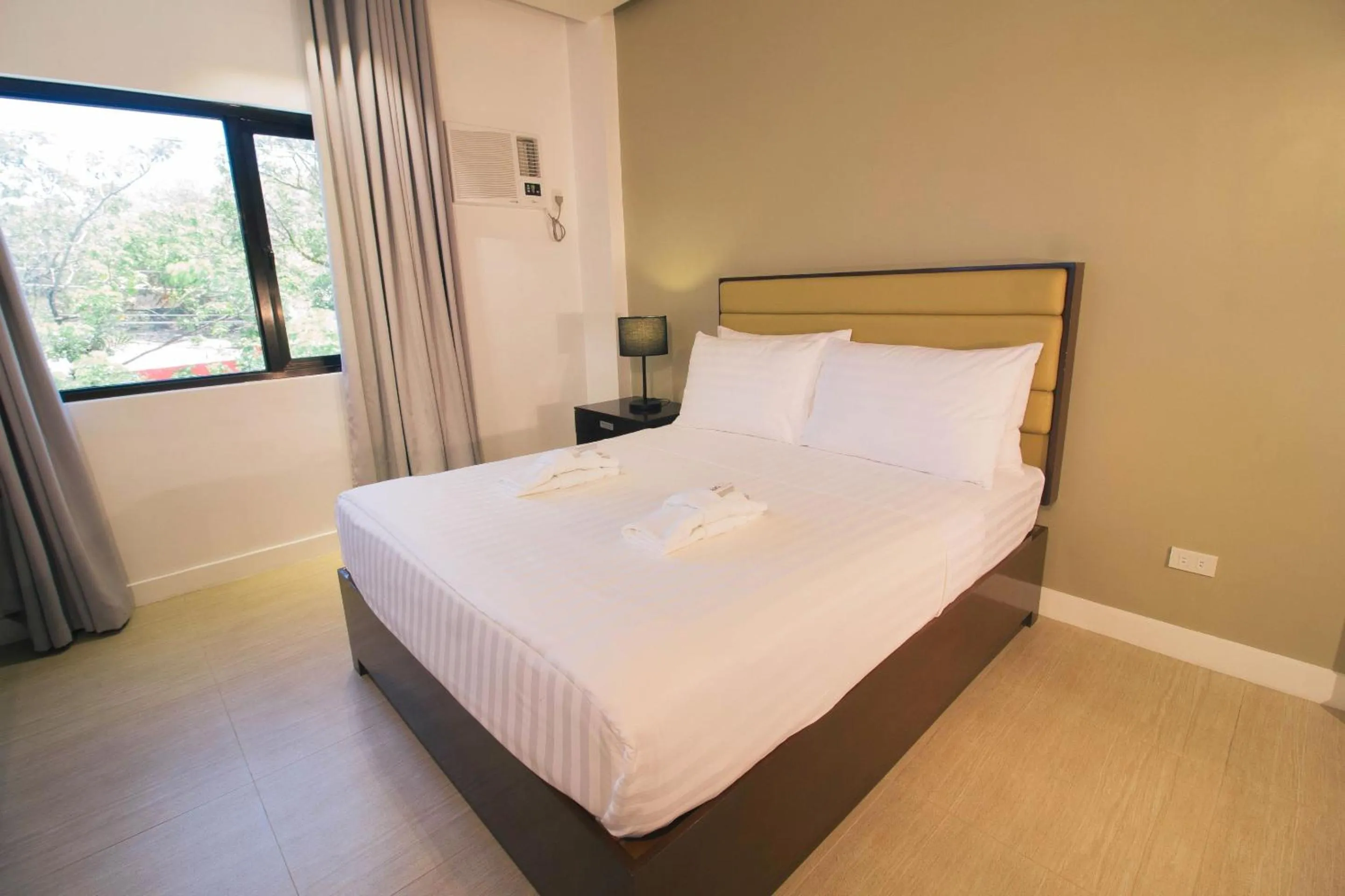 Bed in Aura Condotel