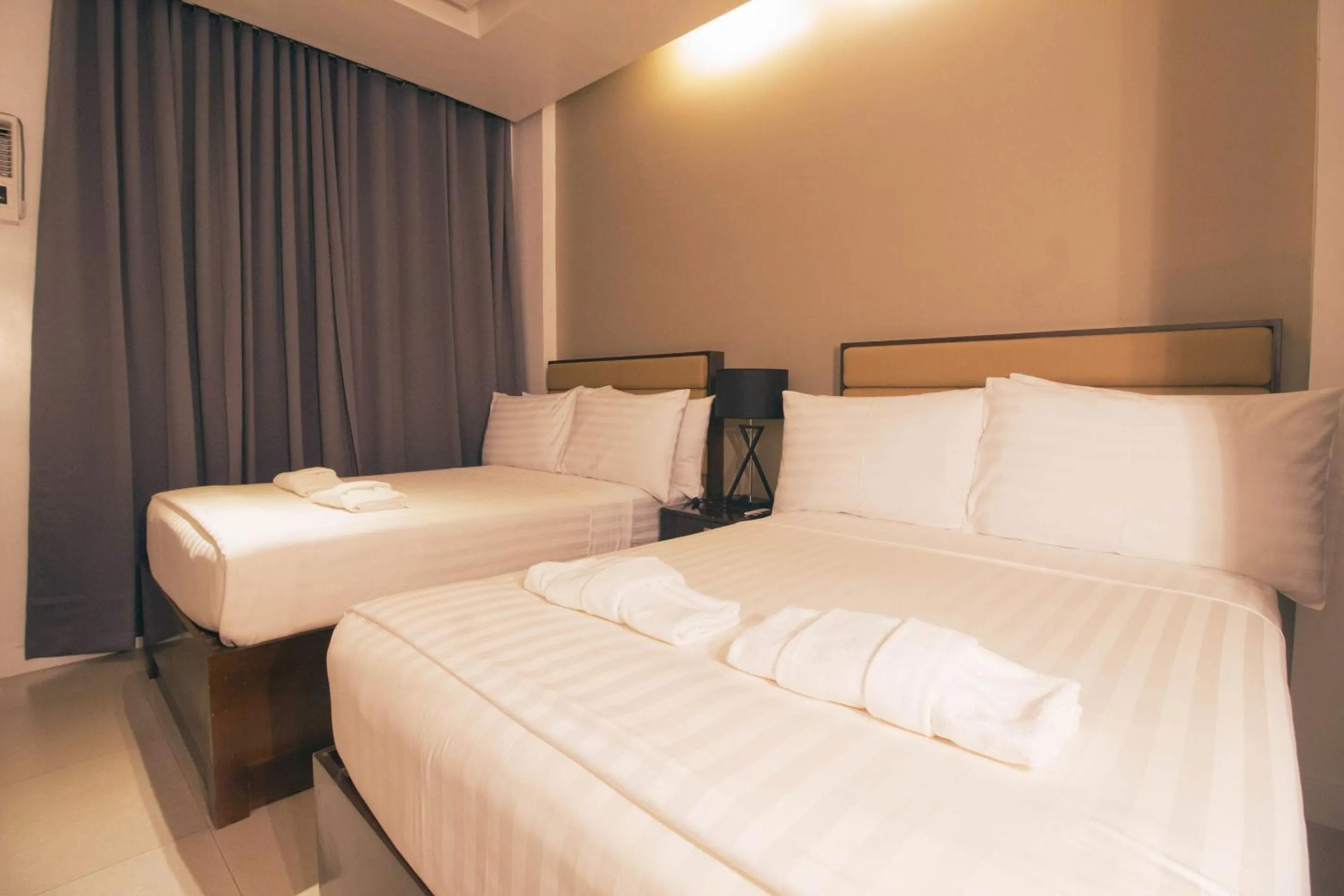 Bed in Aura Condotel