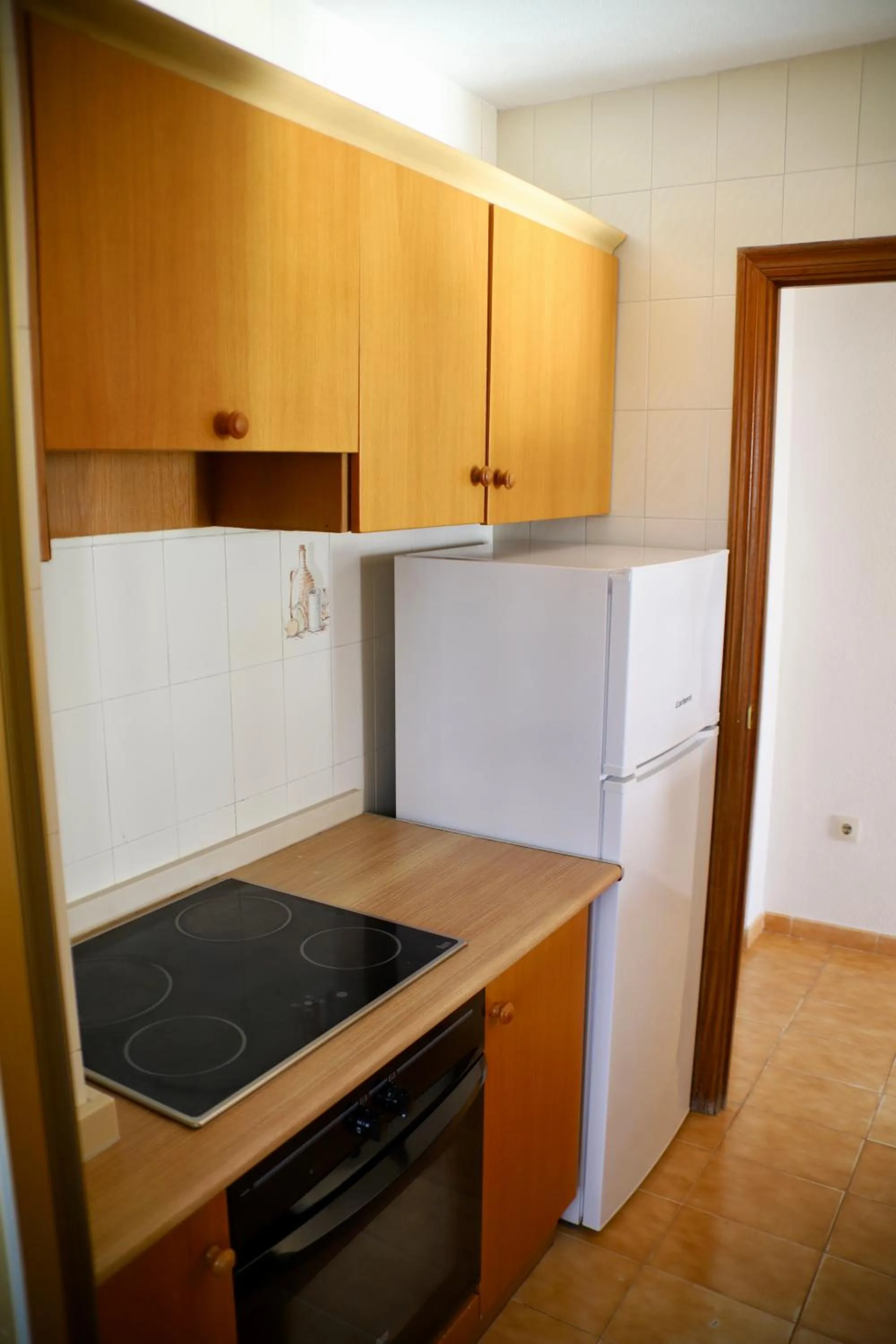 Kitchen or kitchenette in Apartamentos Torre Gerona