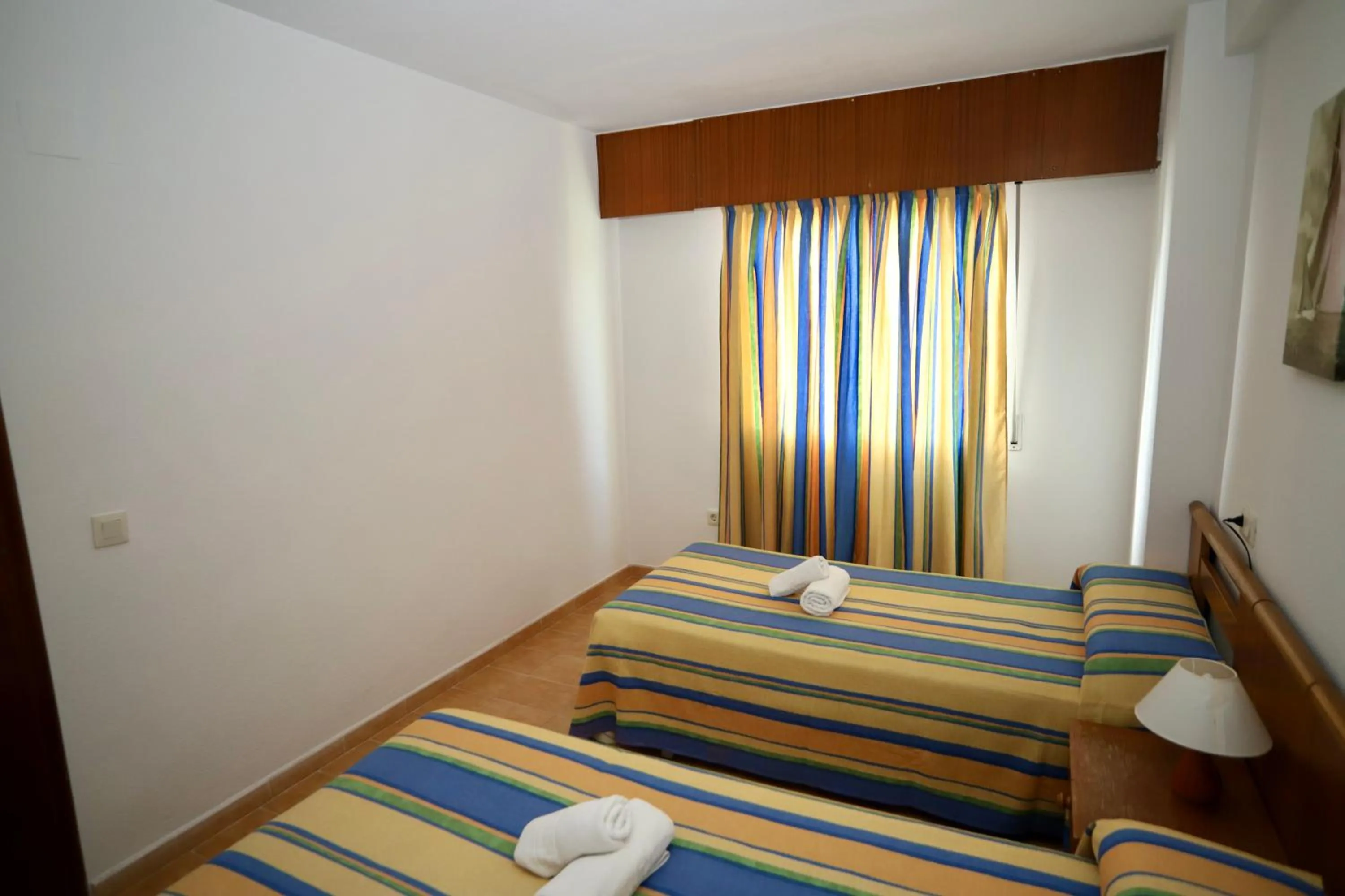 Bedroom, Bed in Apartamentos Torre Gerona