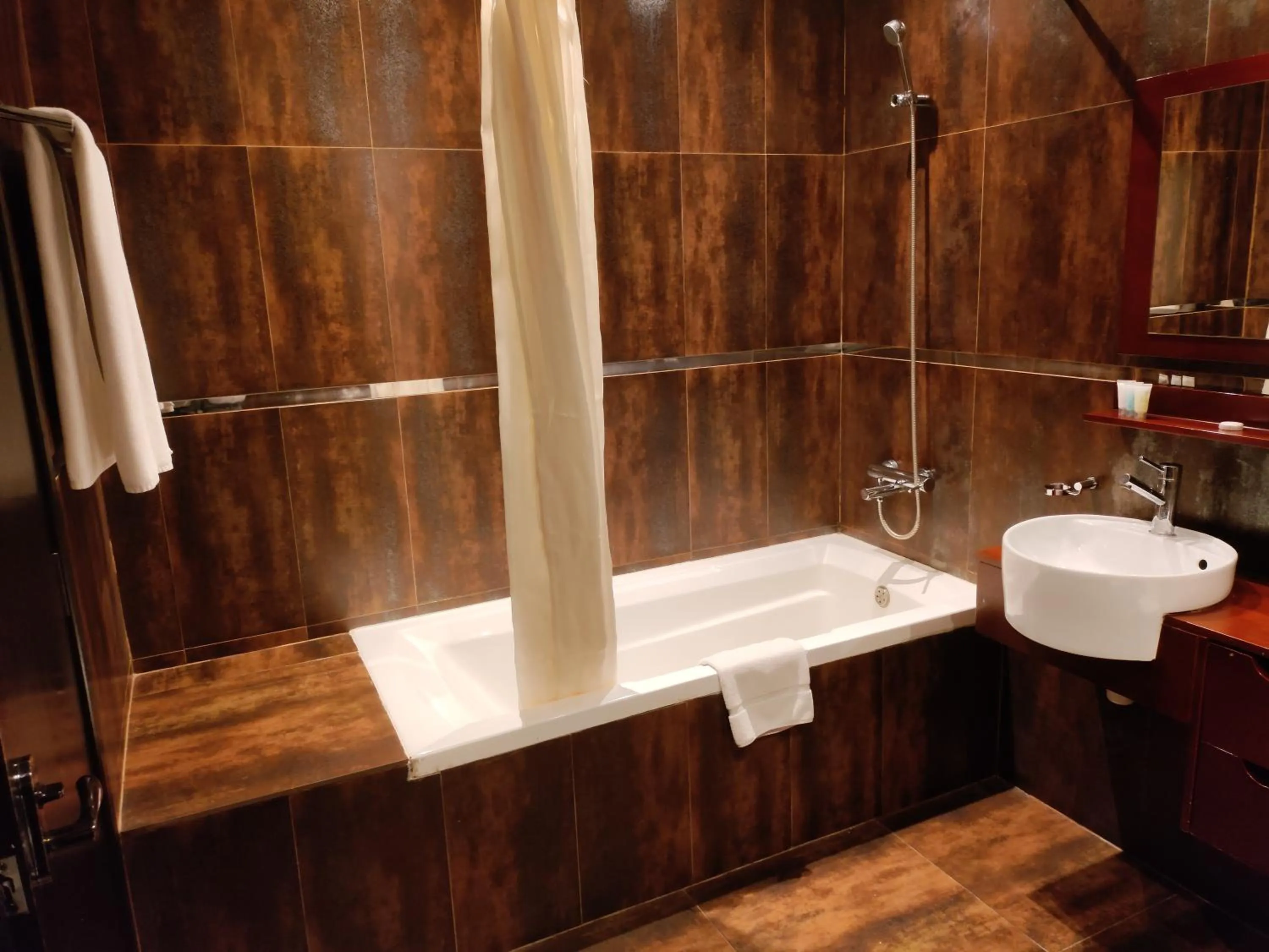 Bathroom in Al Manzil Hotel Bahrain