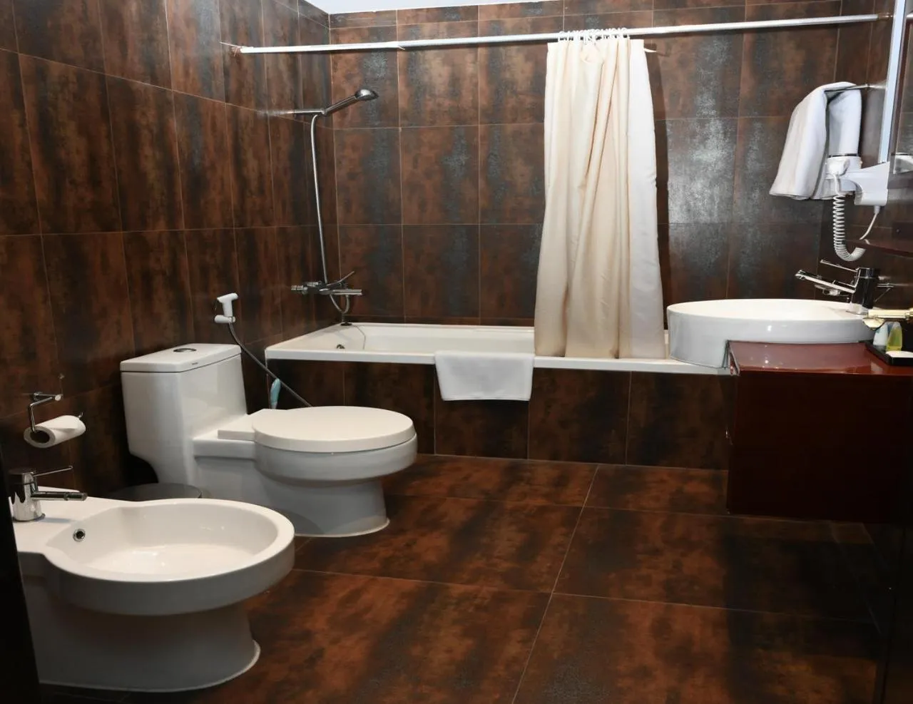 Bathroom in Al Manzil Hotel Bahrain