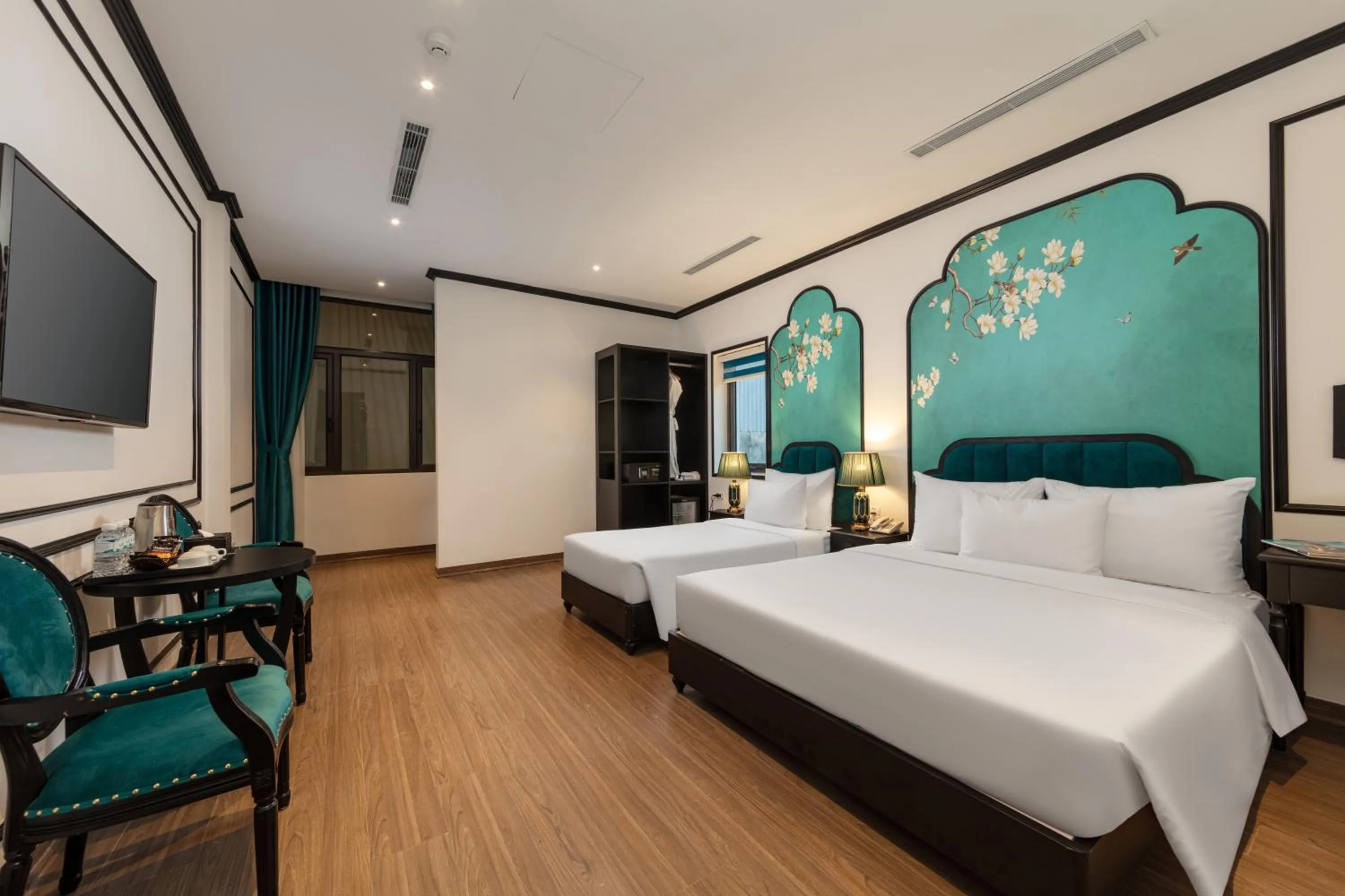 Communal lounge/ TV room, Bed in Azen Lakeside Hotel & Travel