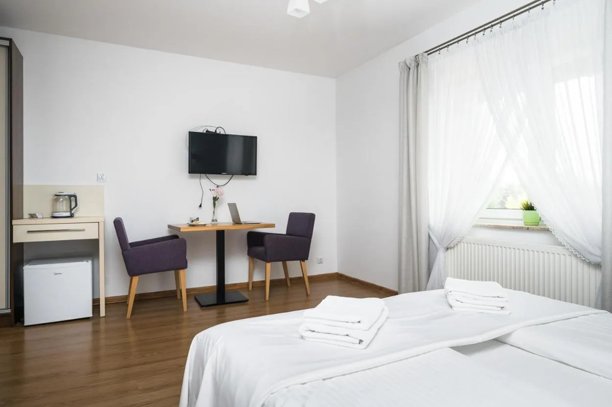 Seating area, Bed in Zajazd Gielarek