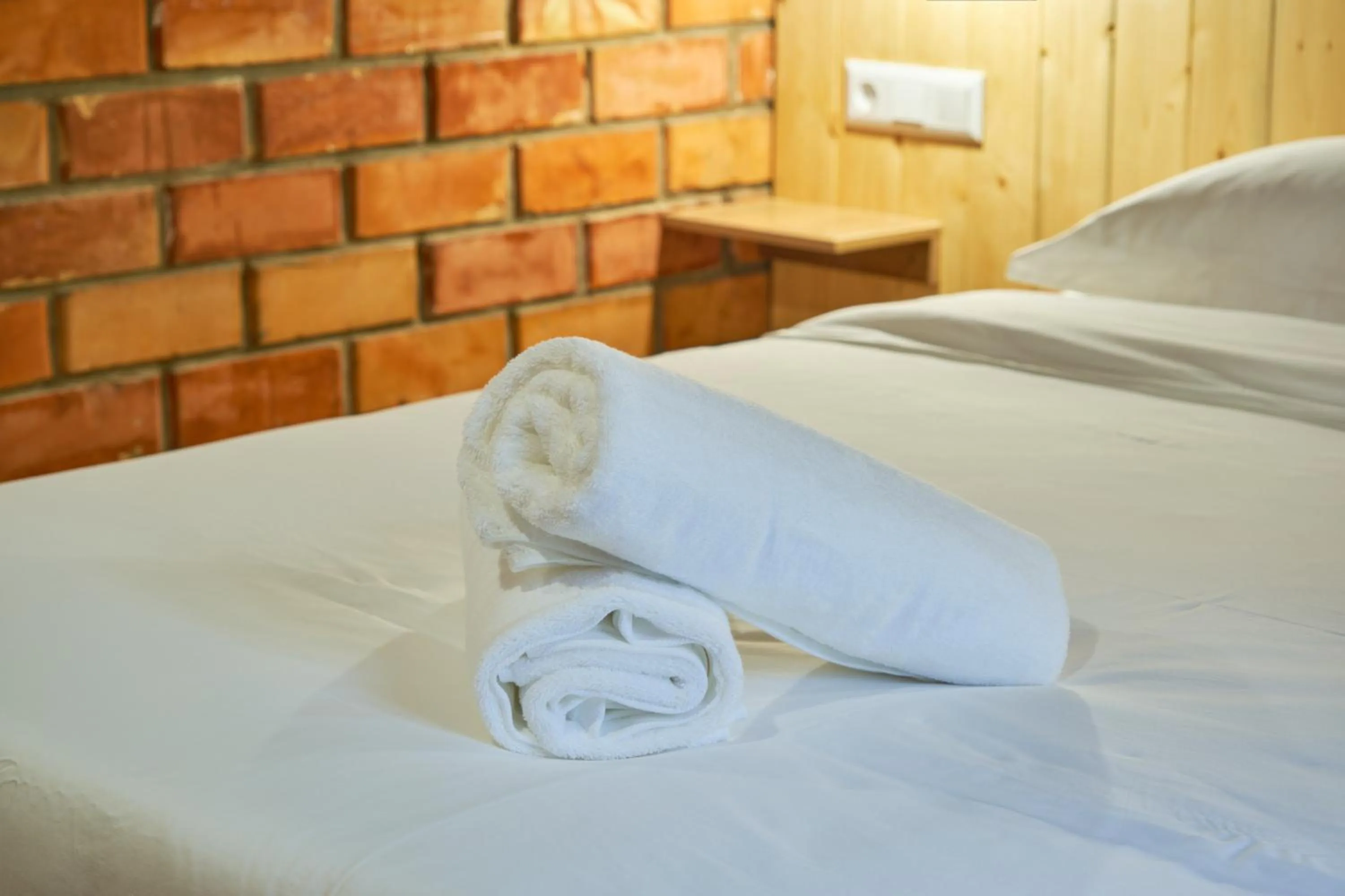 Bed in Pristine Hotel