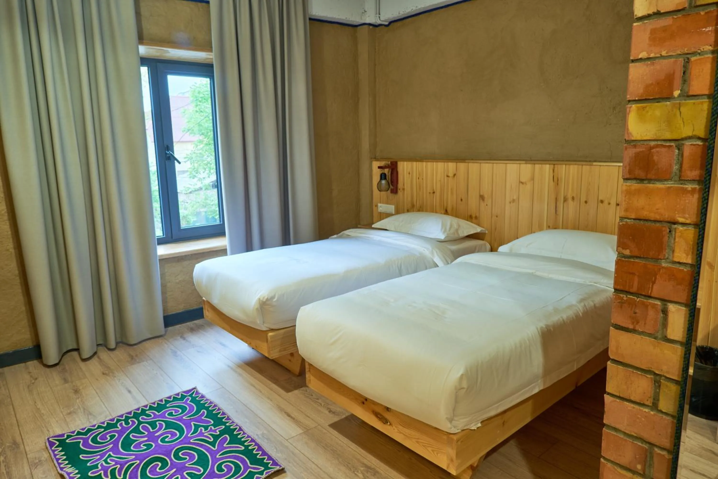 Bed in Pristine Hotel