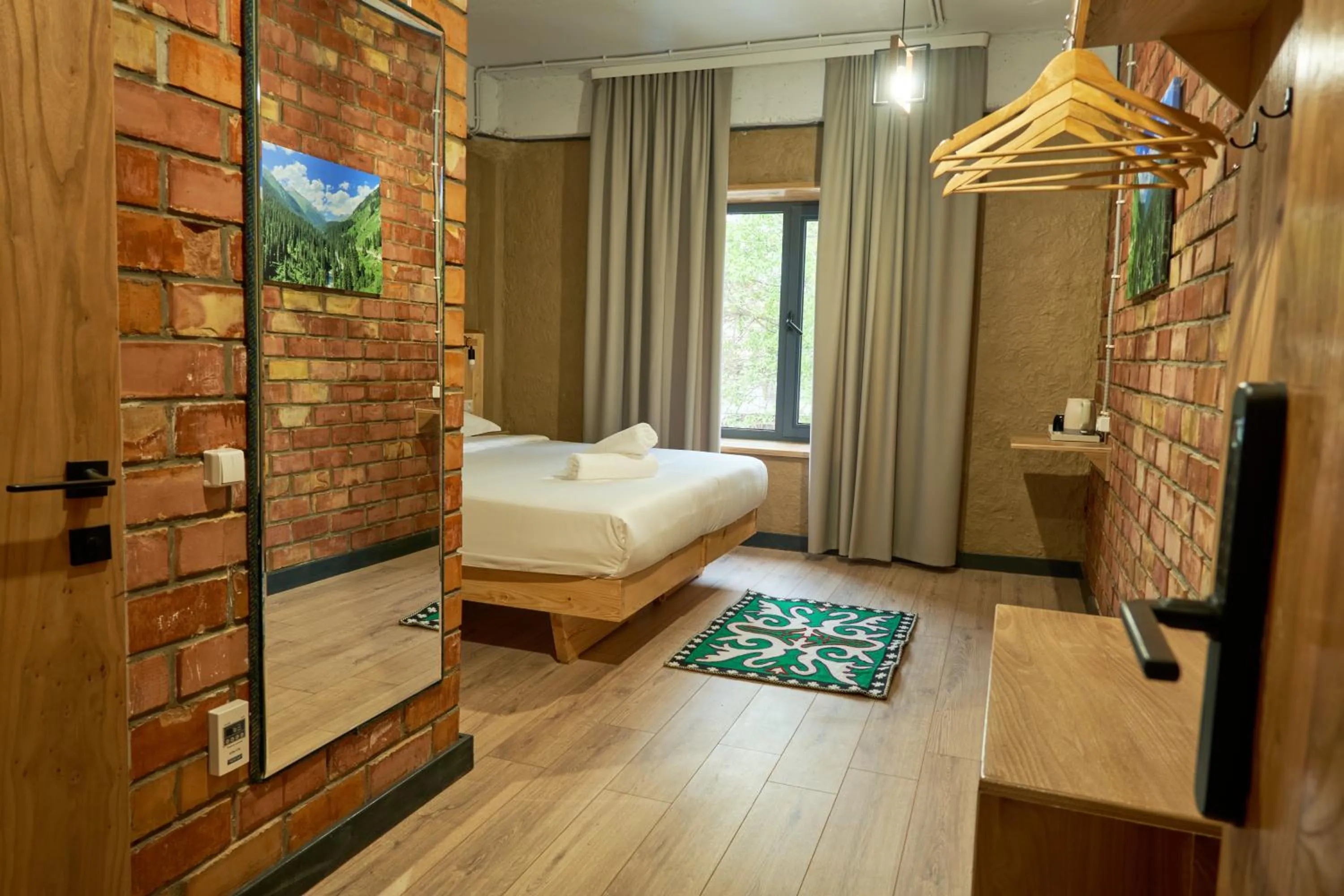 Bed in Pristine Hotel