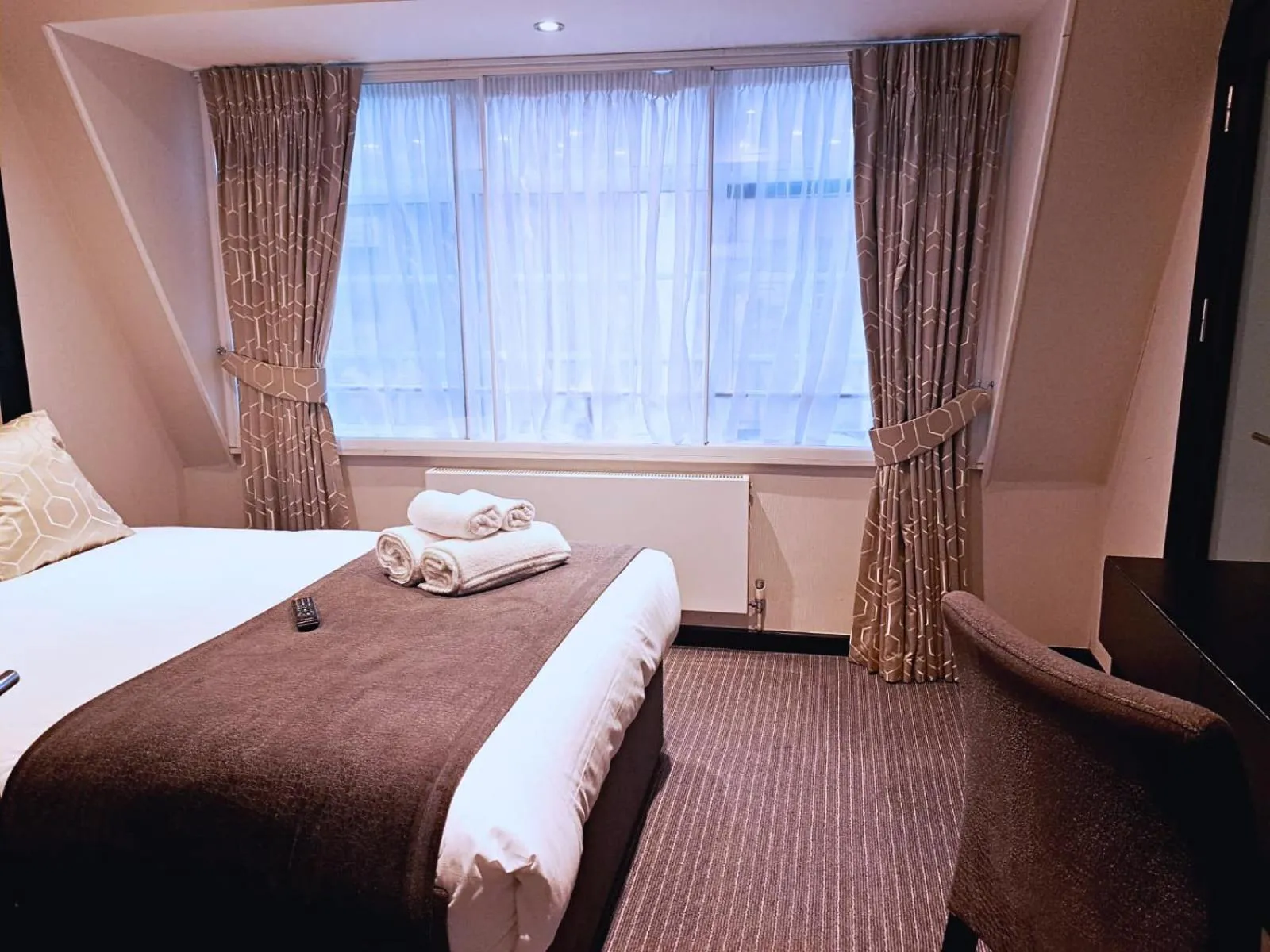 Bed in Great St Helen Hotel