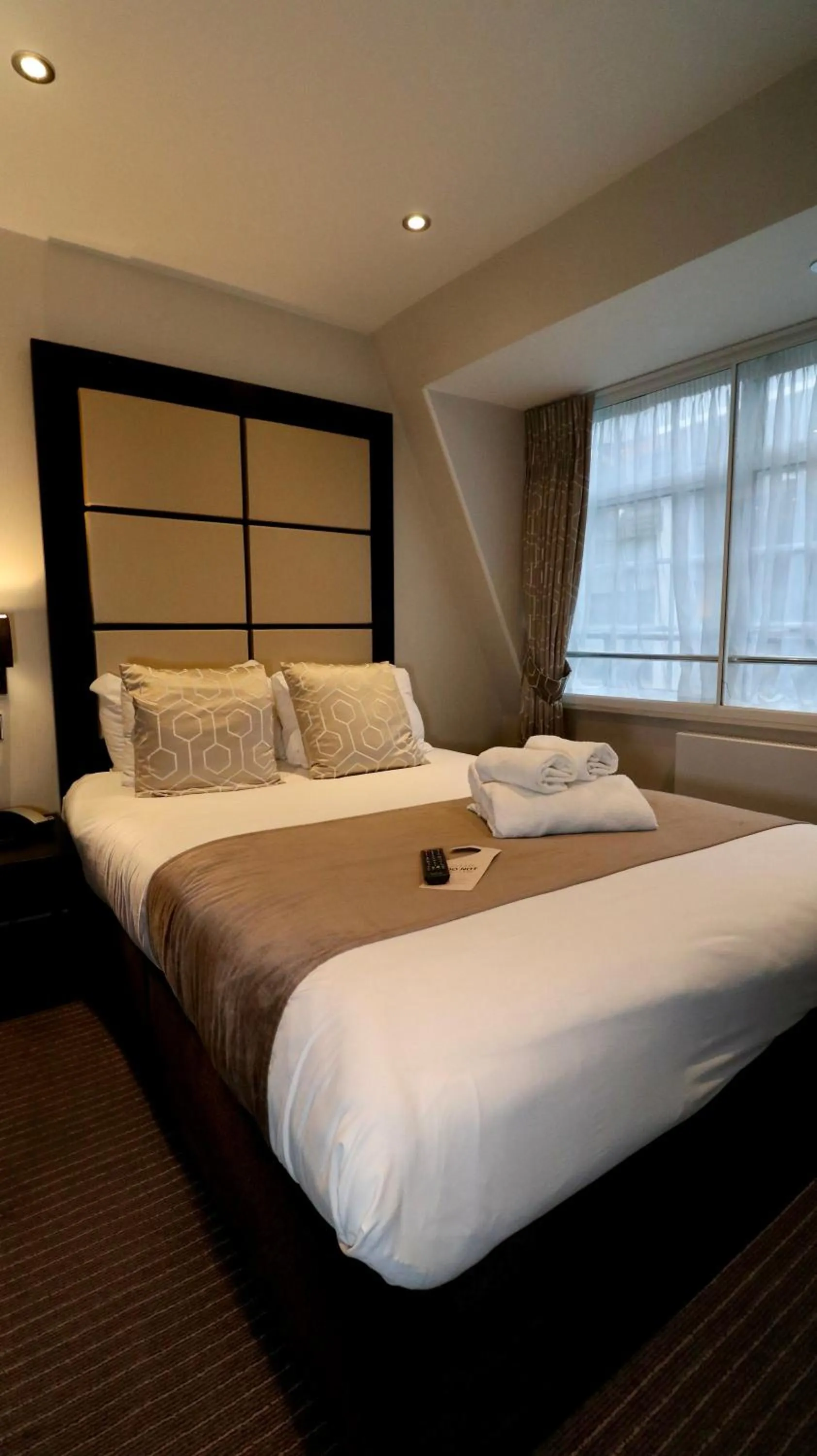 Bed in Great St Helen Hotel