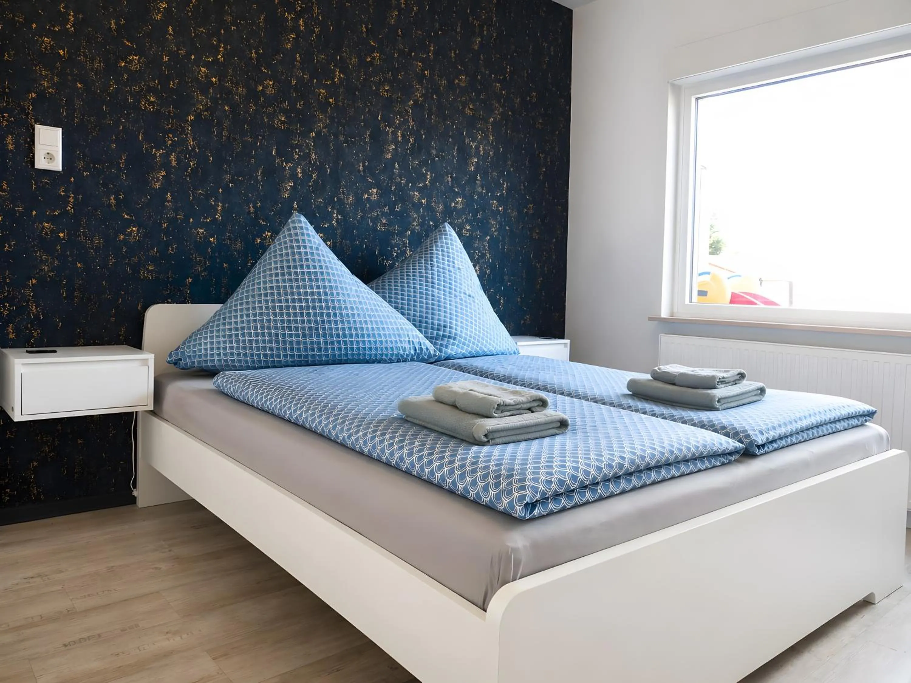 Living room, Bed in Haus Ostfriesland